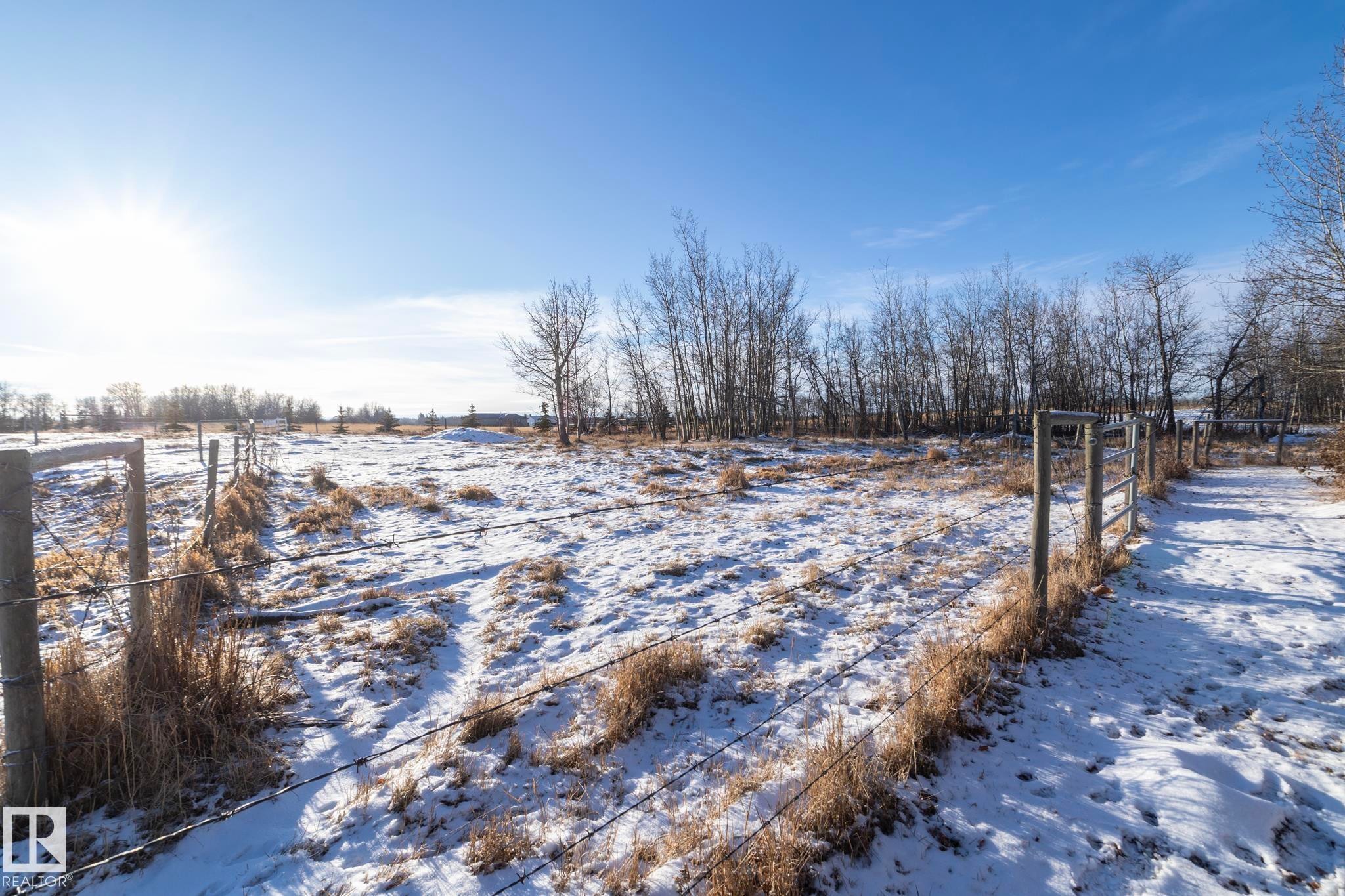 Fenced area to field - 57524 Range Road 270, Rural Westlock County, AB - Outdoor With View