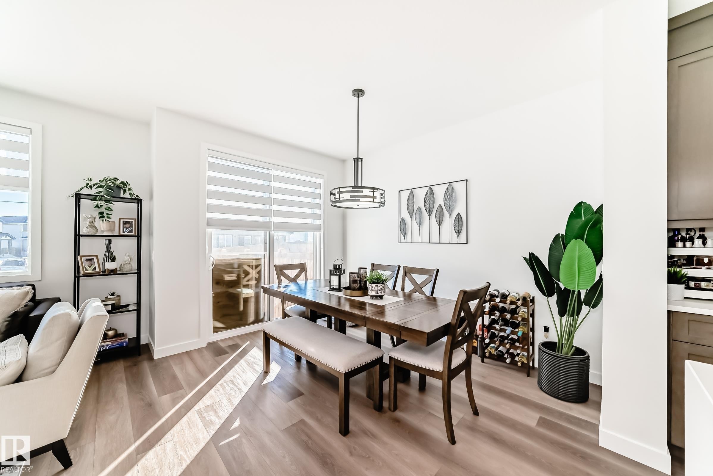Dining area featuring light wood-style floors - 3569 Erlanger Link, Edmonton, AB - Indoor Photo Showing Dining Room