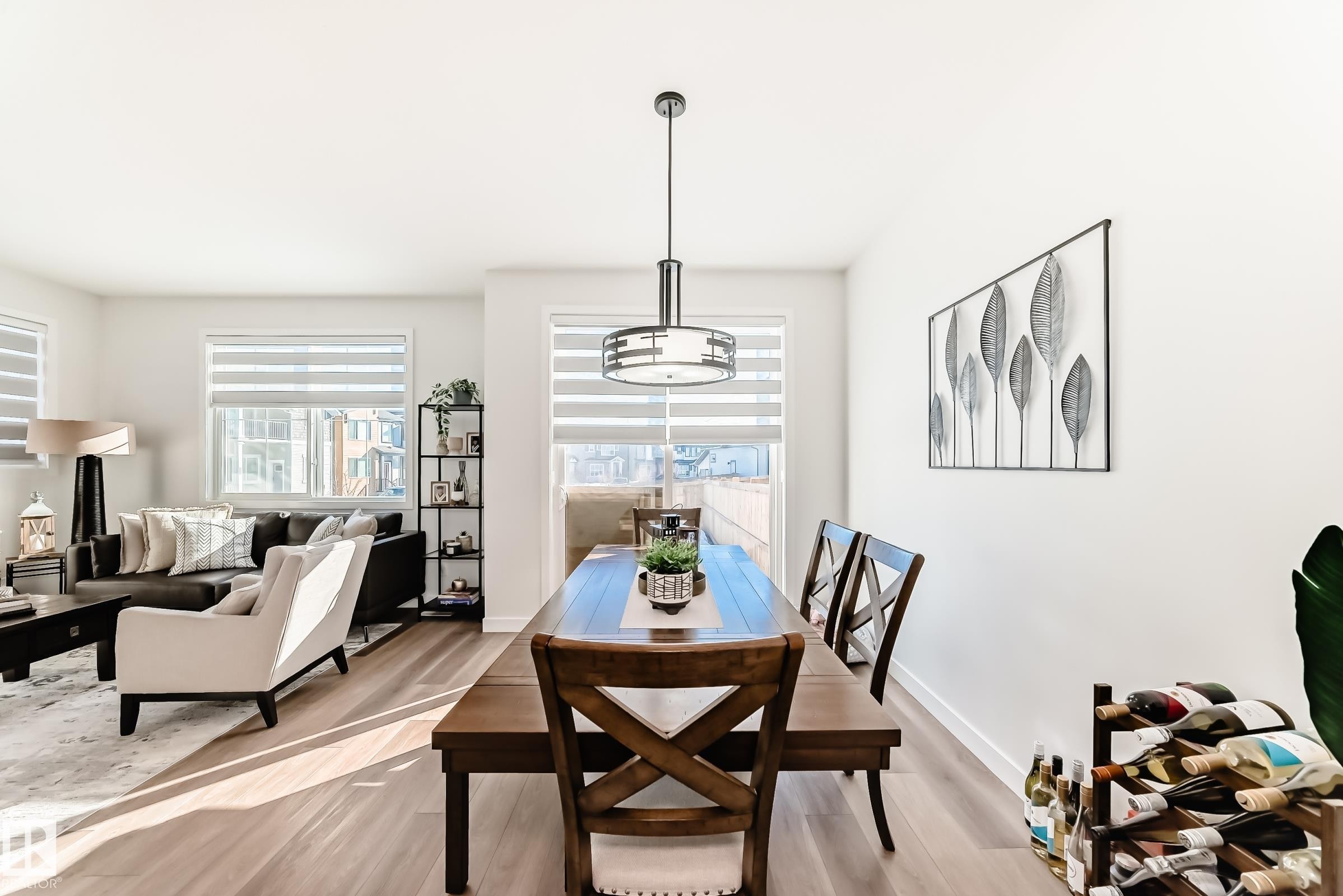 Dining area with wood finished floors and baseboards - 3569 Erlanger Link, Edmonton, AB - Indoor