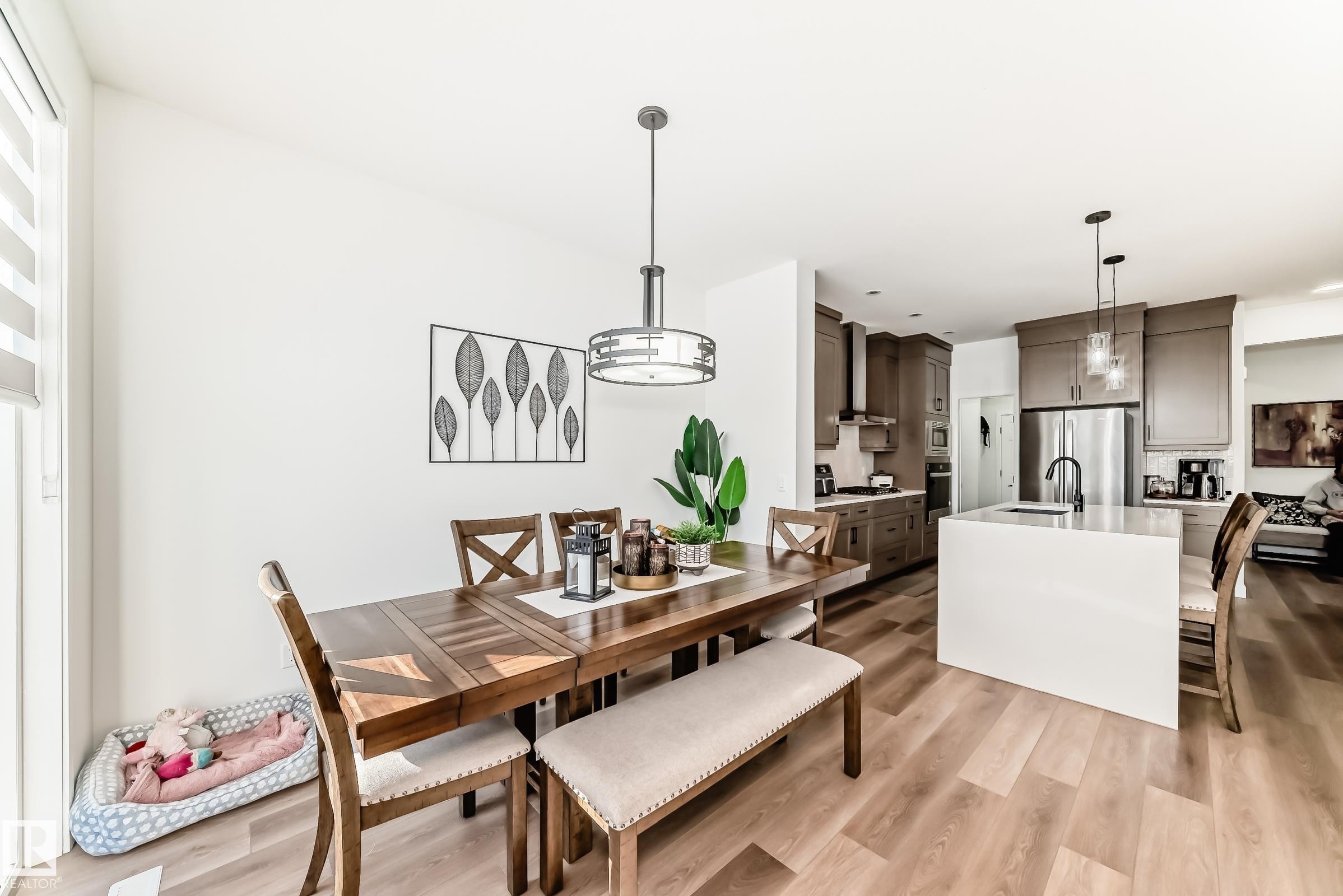 Dining room with light wood-style floors - 3569 Erlanger Link, Edmonton, AB - Indoor Photo Showing Dining Room