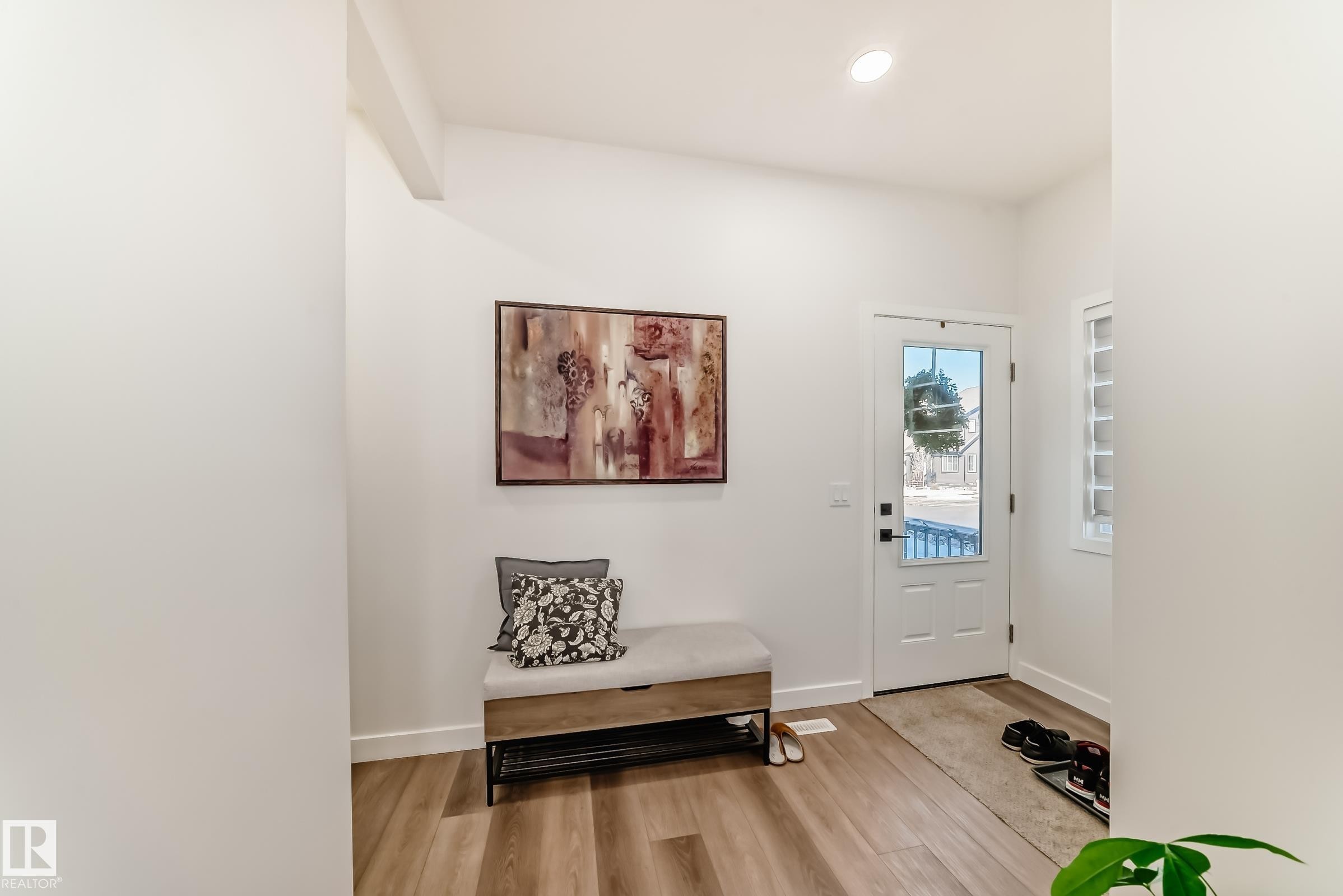 Entrance foyer featuring light wood-style floors and recessed lighting - 3569 Erlanger Link, Edmonton, AB - Indoor Photo Showing Other Room