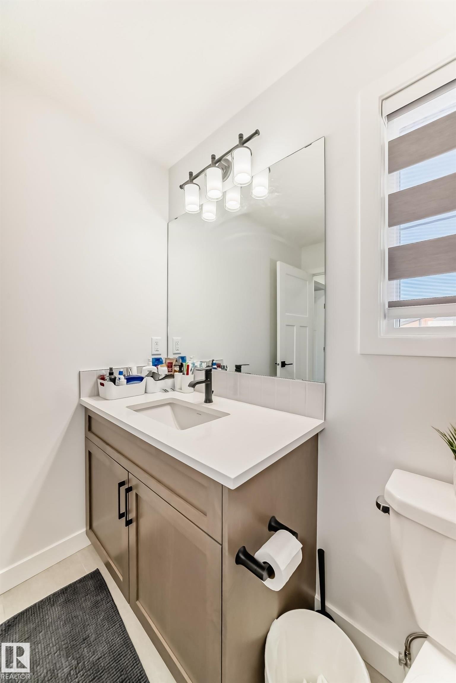 Bathroom with vanity and toilet - 3569 Erlanger Link, Edmonton, AB - Indoor Photo Showing Bathroom