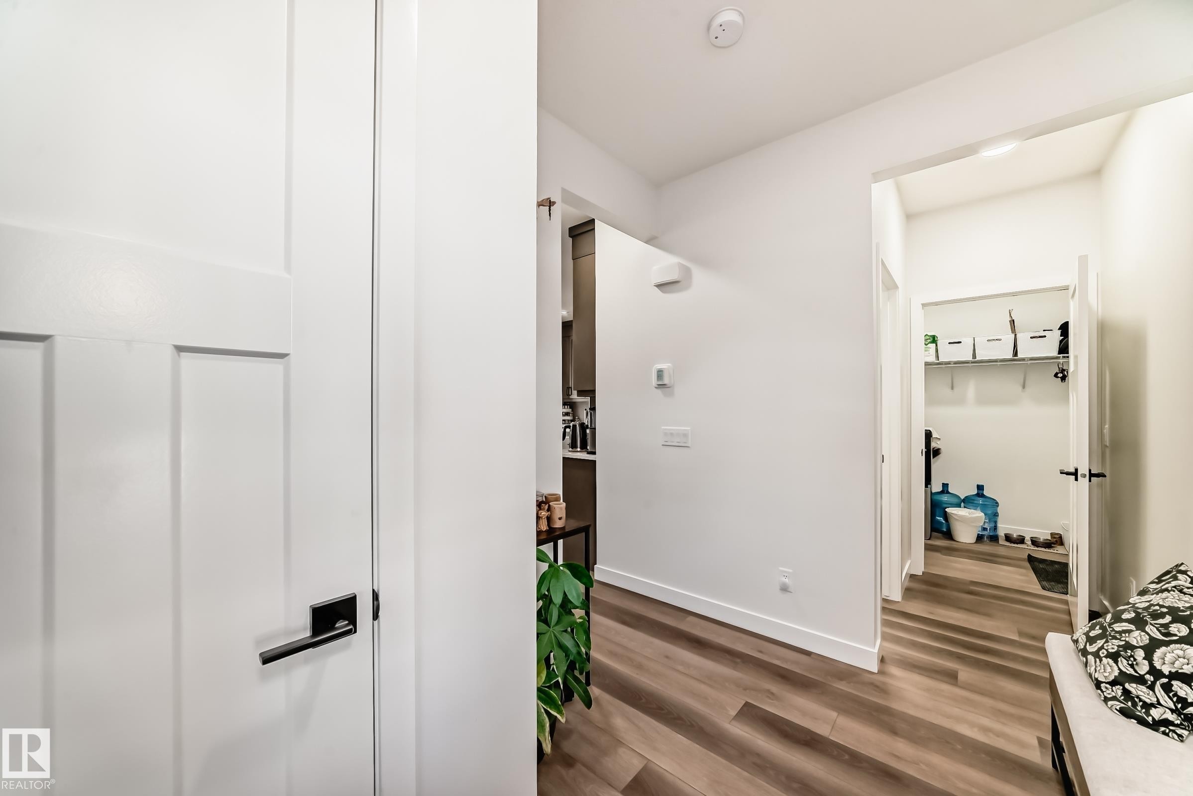 Corridor featuring baseboards and dark wood-type flooring - 3569 Erlanger Link, Edmonton, AB - Indoor Photo Showing Other Room