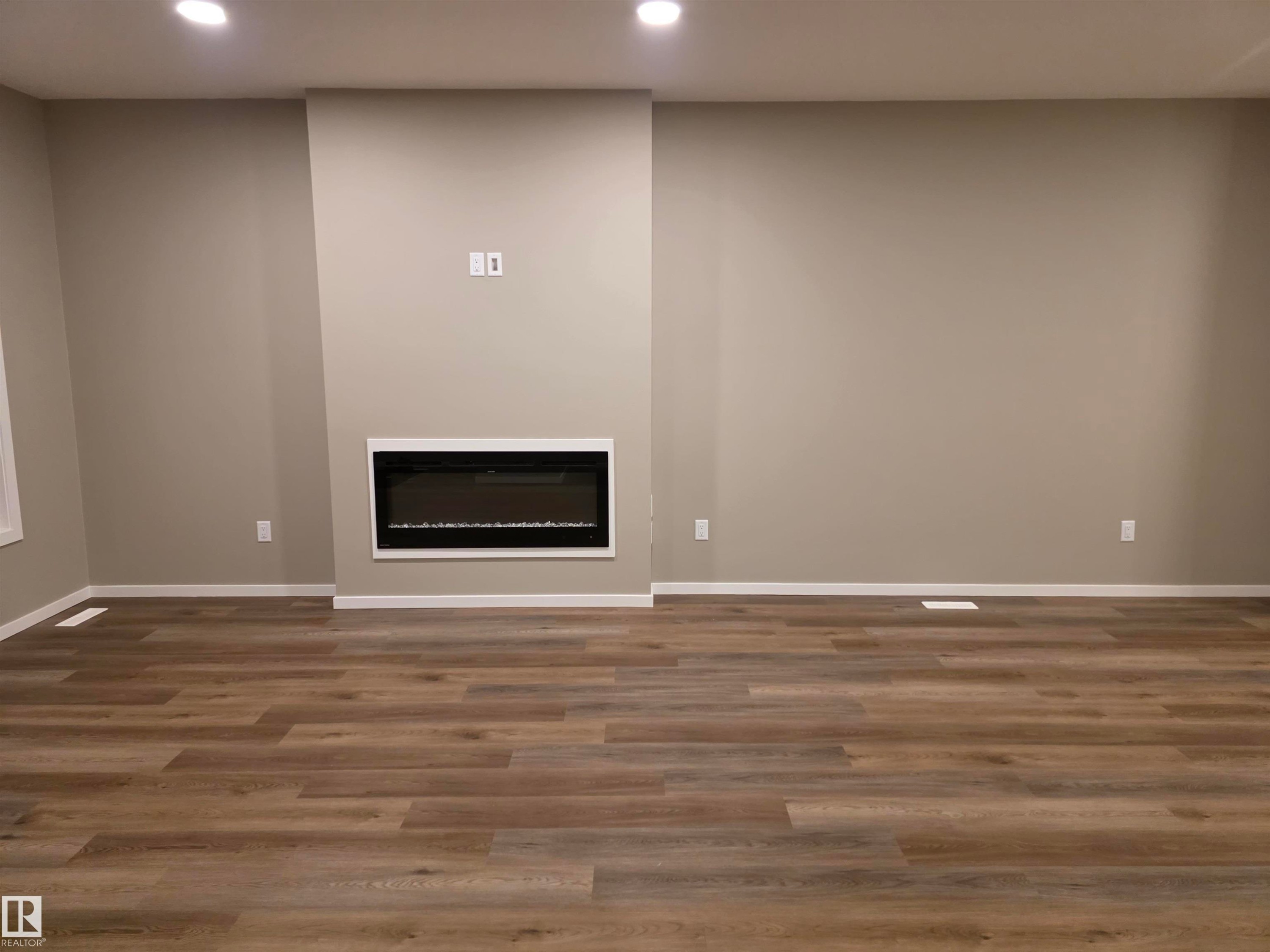 11 Sereno Lane, Fort Saskatchewan, AB - Indoor Photo Showing Other Room With Fireplace