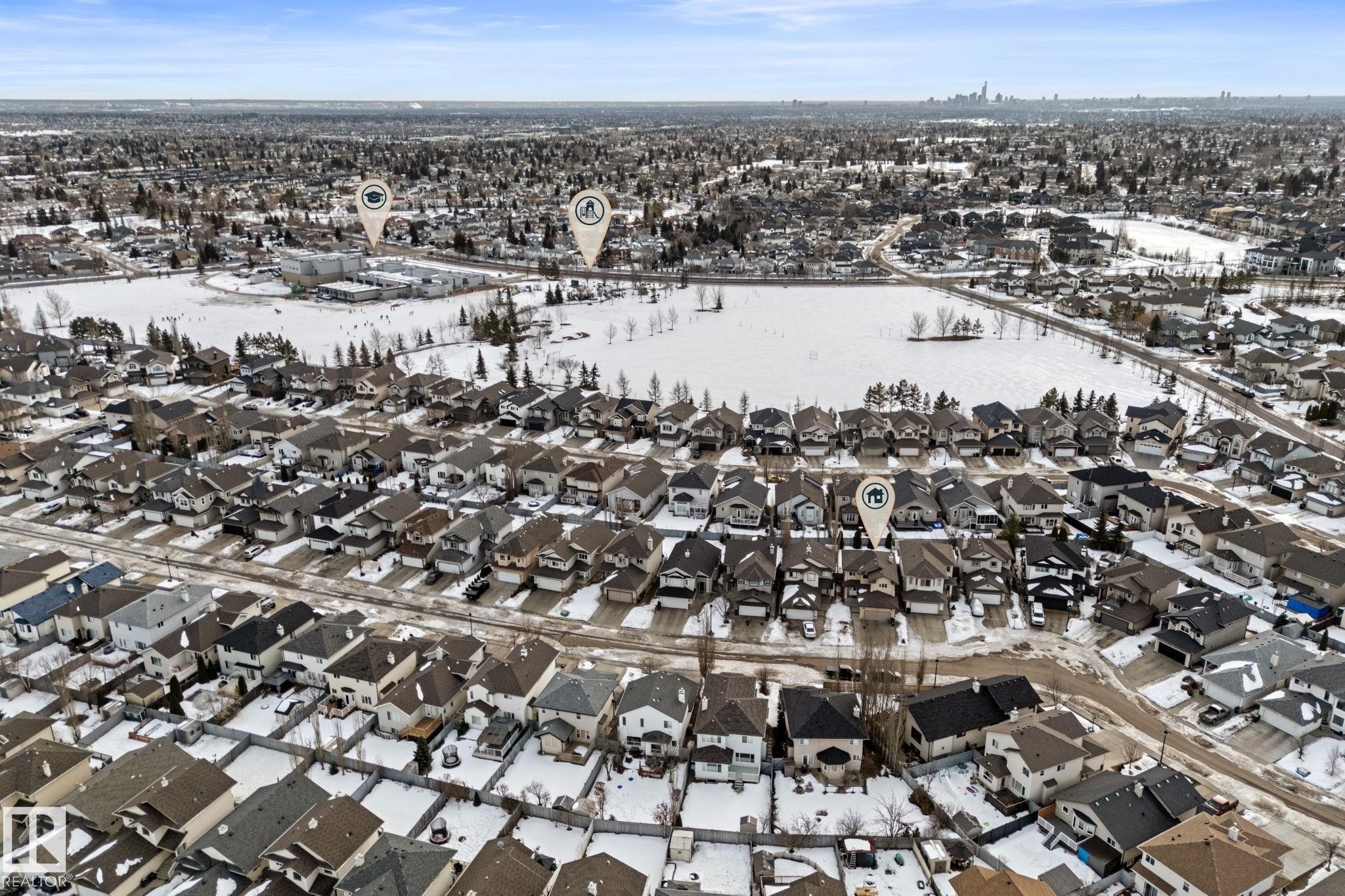 Snowy aerial view with a residential view - 10655 181 Avenue, Edmonton, AB - Outdoor With View