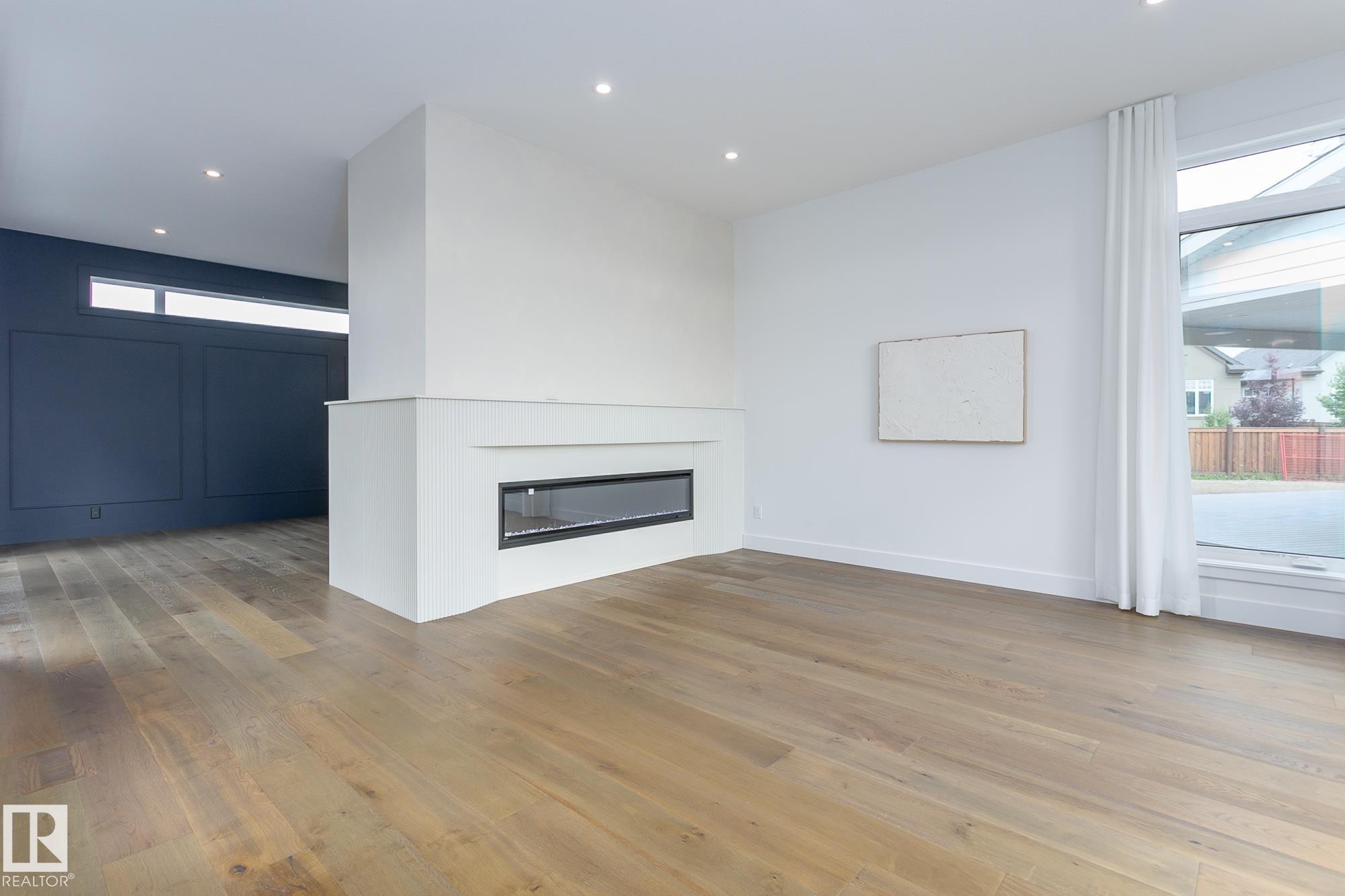 152 Hays Ridge Boulevard Sw, Edmonton, AB - Indoor Photo Showing Living Room With Fireplace