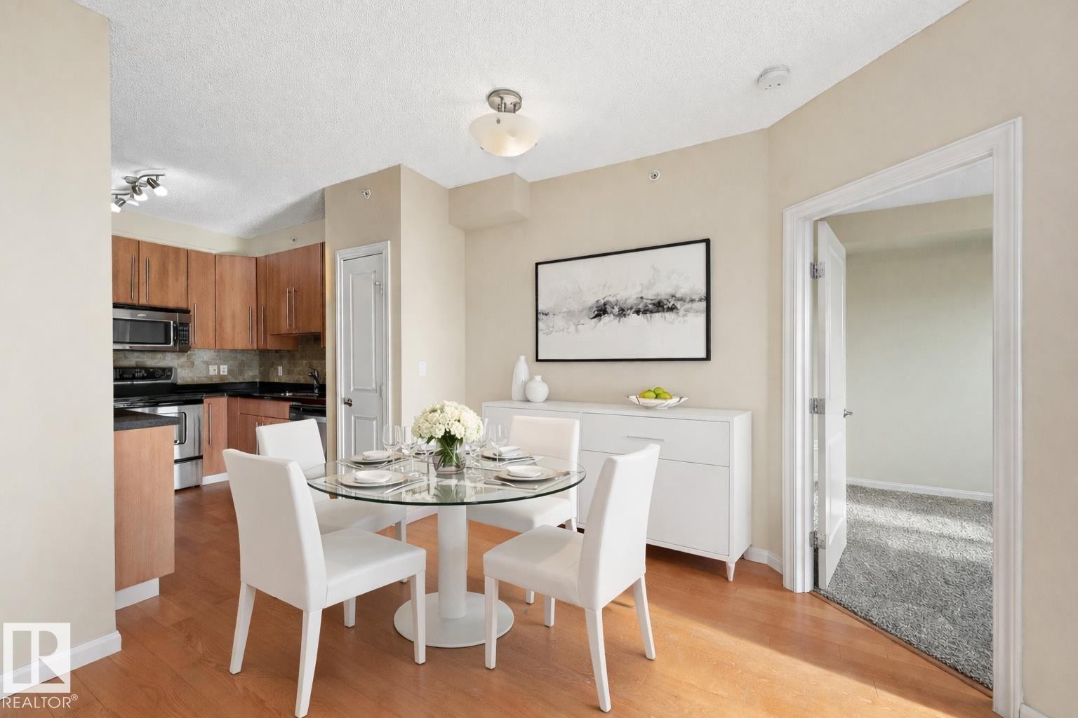 Photo has virtual staging - 304 9819 104 Street, Edmonton, AB - Indoor Photo Showing Dining Room