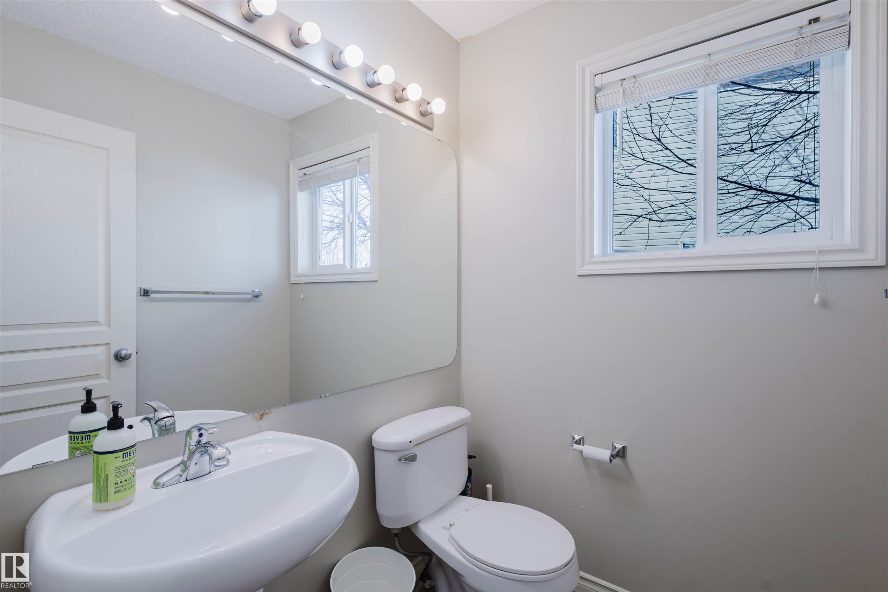 Half bathroom featuring a sink and toilet - 3534 Mclean Crescent, Edmonton, AB - Indoor Photo Showing Bathroom