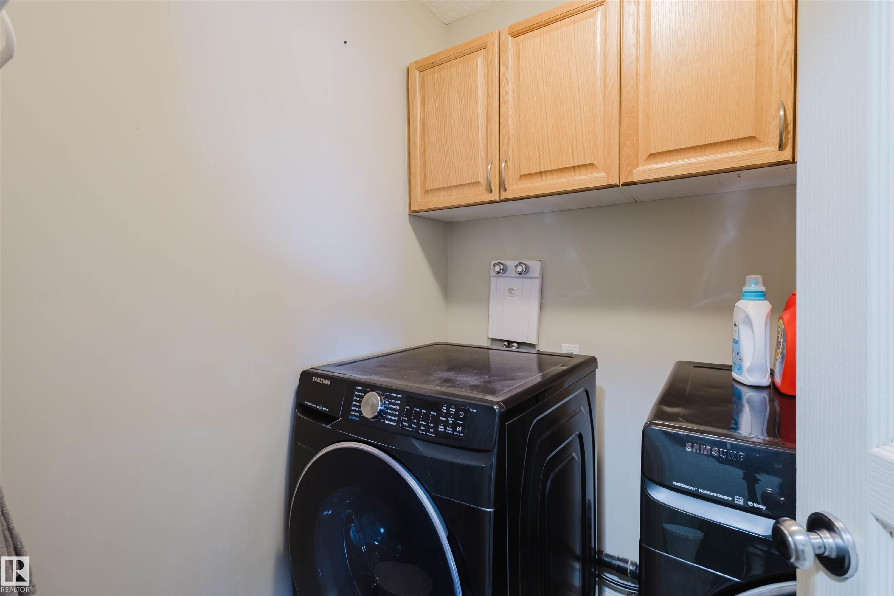 Laundry room with cabinet space - 3534 Mclean Crescent, Edmonton, AB - Indoor Photo Showing Laundry Room