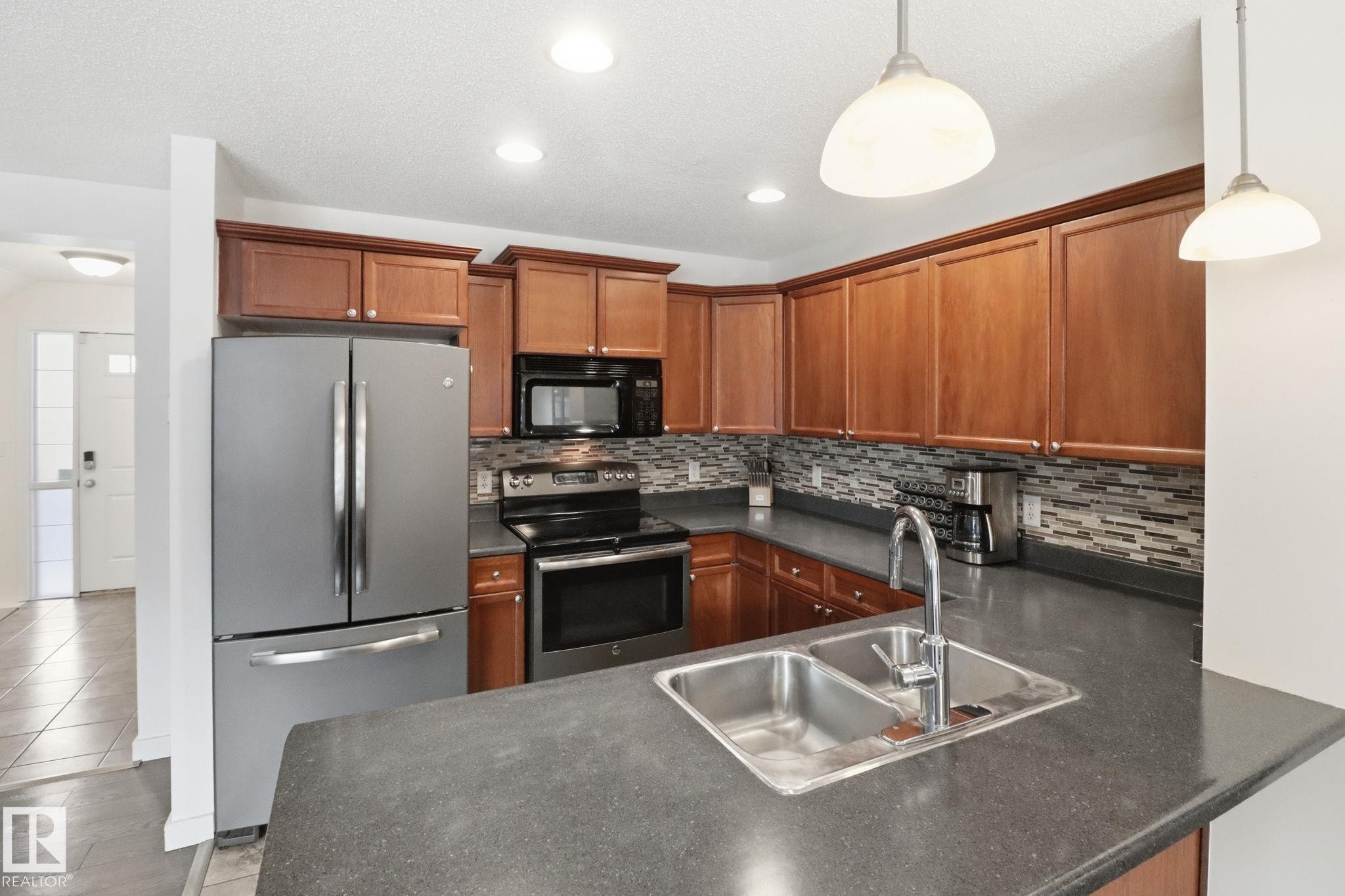 9037 Scott Crescent, Edmonton, AB - Indoor Photo Showing Kitchen With Double Sink