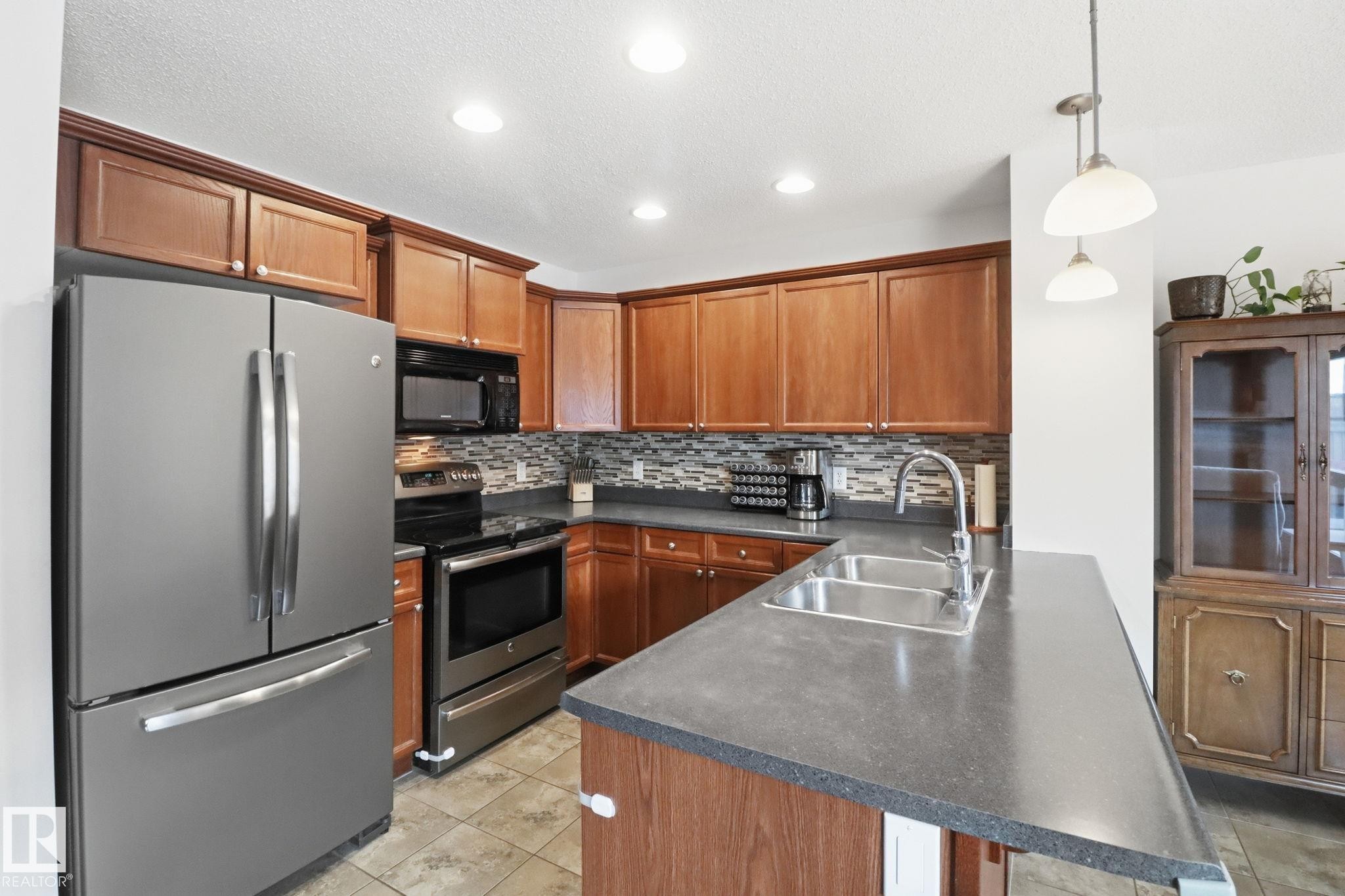 9037 Scott Crescent, Edmonton, AB - Indoor Photo Showing Kitchen With Double Sink