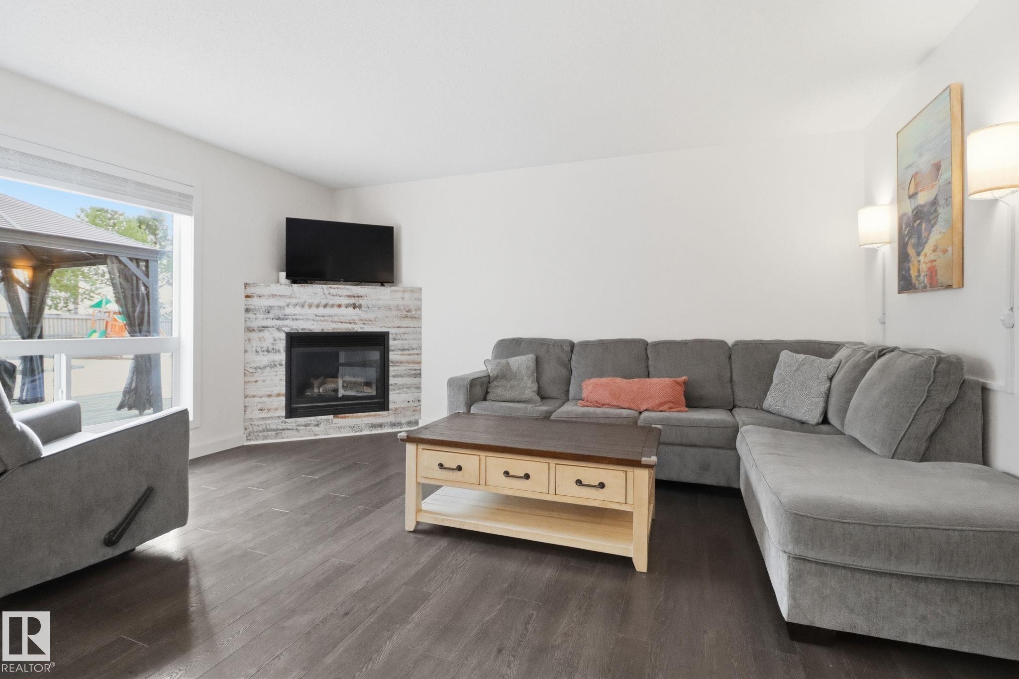 9037 Scott Crescent, Edmonton, AB - Indoor Photo Showing Living Room With Fireplace