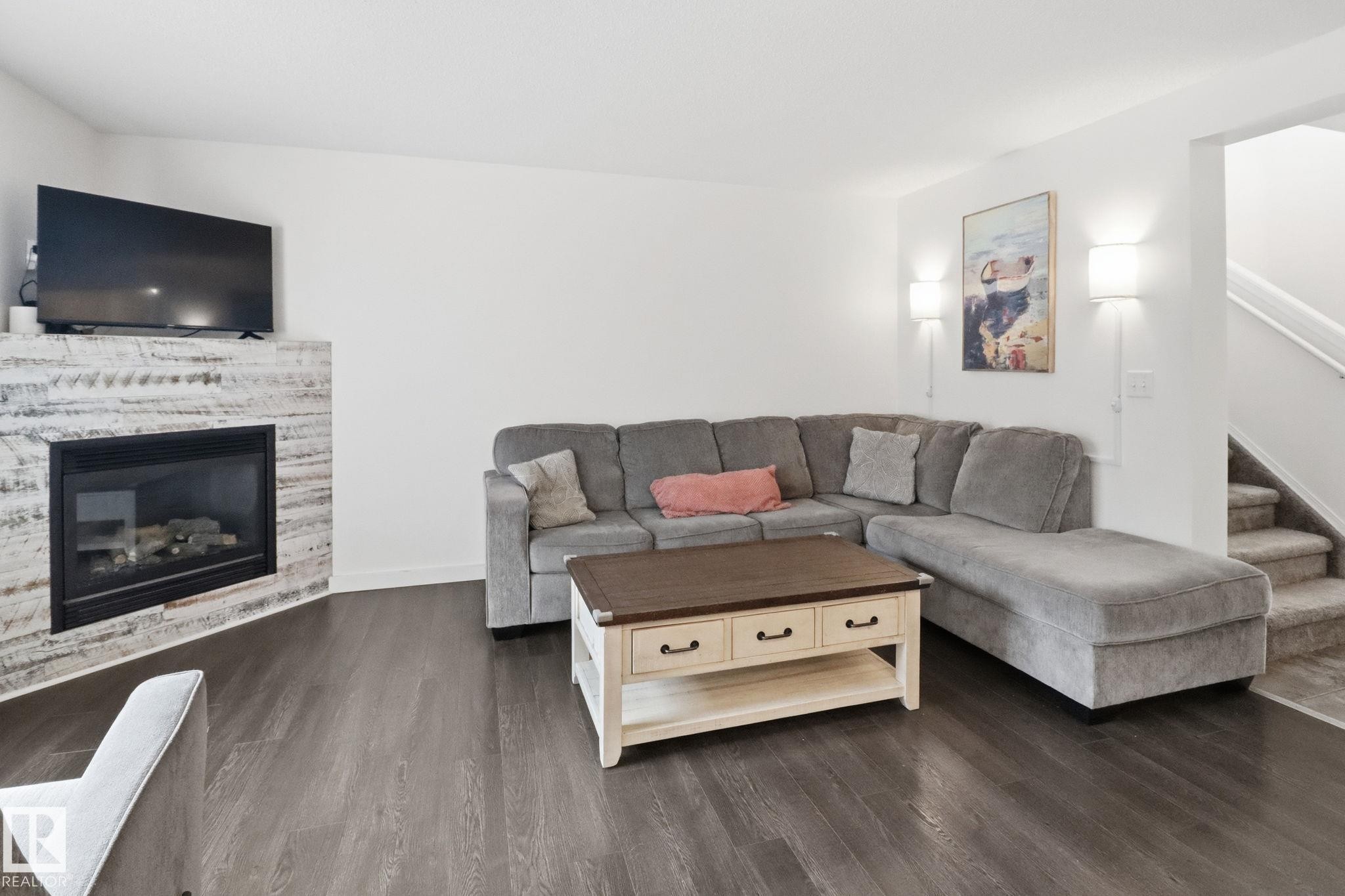9037 Scott Crescent, Edmonton, AB - Indoor Photo Showing Living Room With Fireplace
