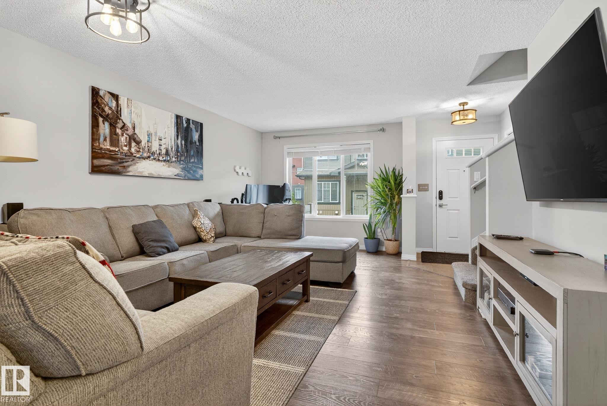 80 3305 Orchards Link Link, Edmonton, AB - Indoor Photo Showing Living Room