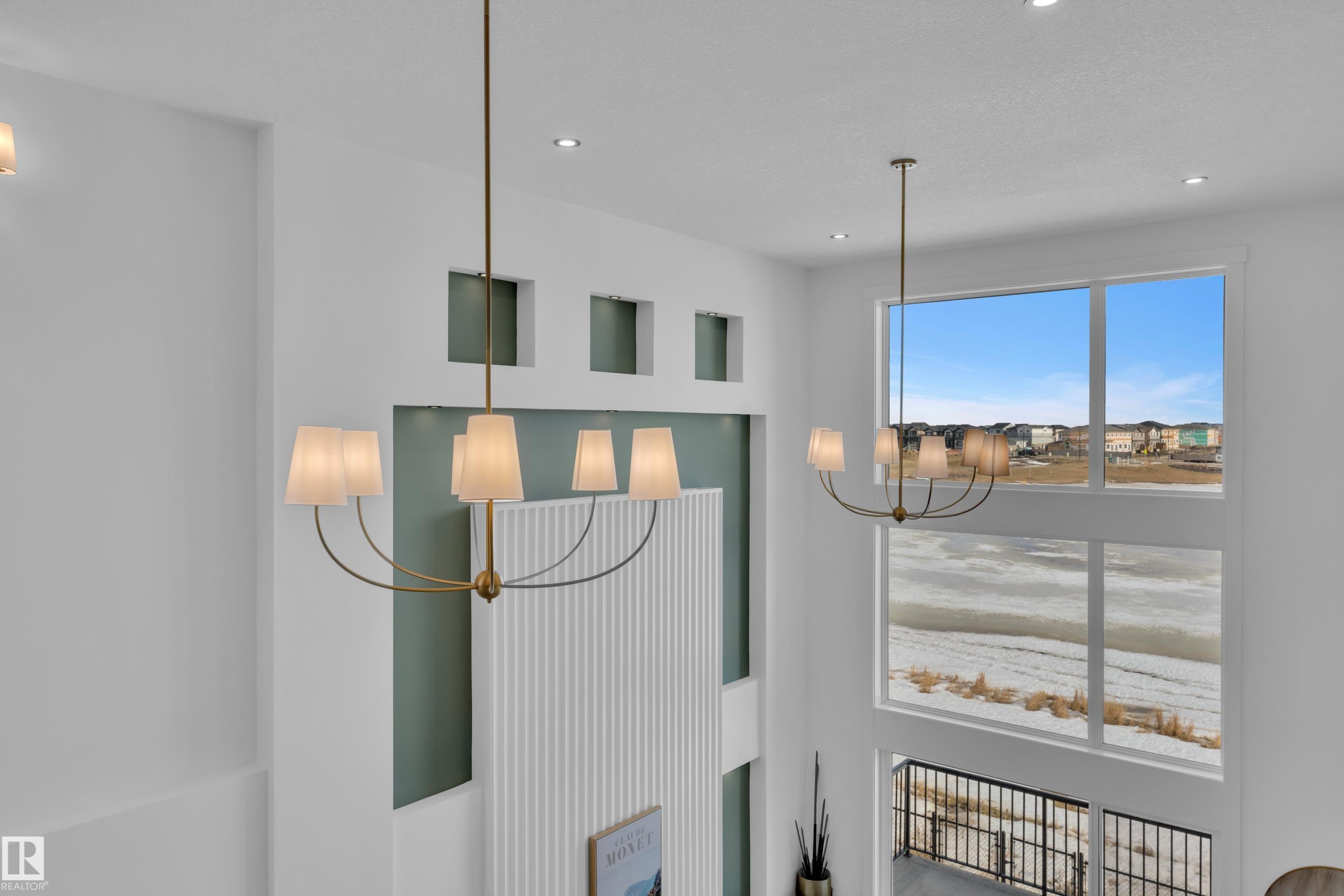 Detailed view of suspended lighting - 228 Linden Loop, Leduc, AB - Indoor Photo Showing Other Room