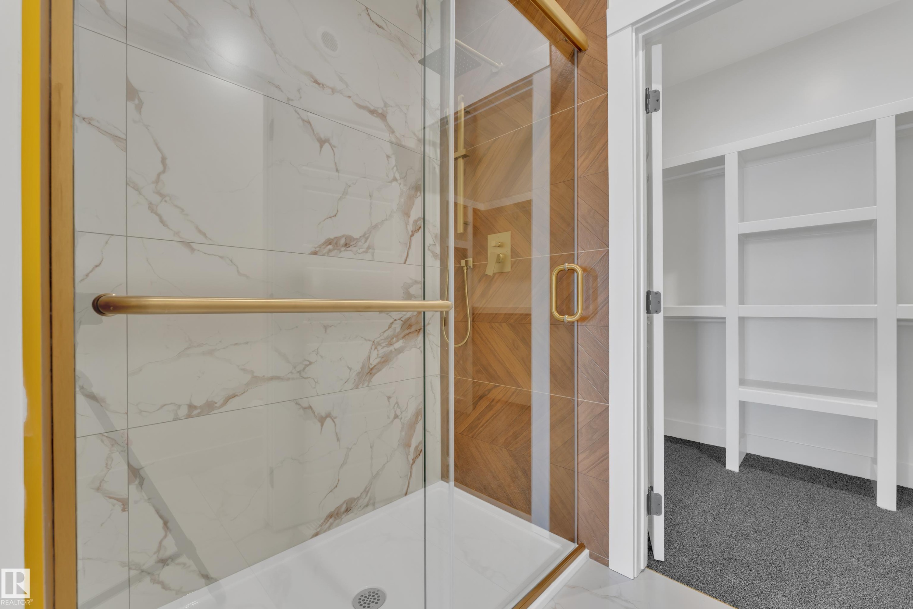 Full bathroom featuring a marble finish shower and carpet flooring - 228 Linden Loop, Leduc, AB - Indoor Photo Showing Bathroom