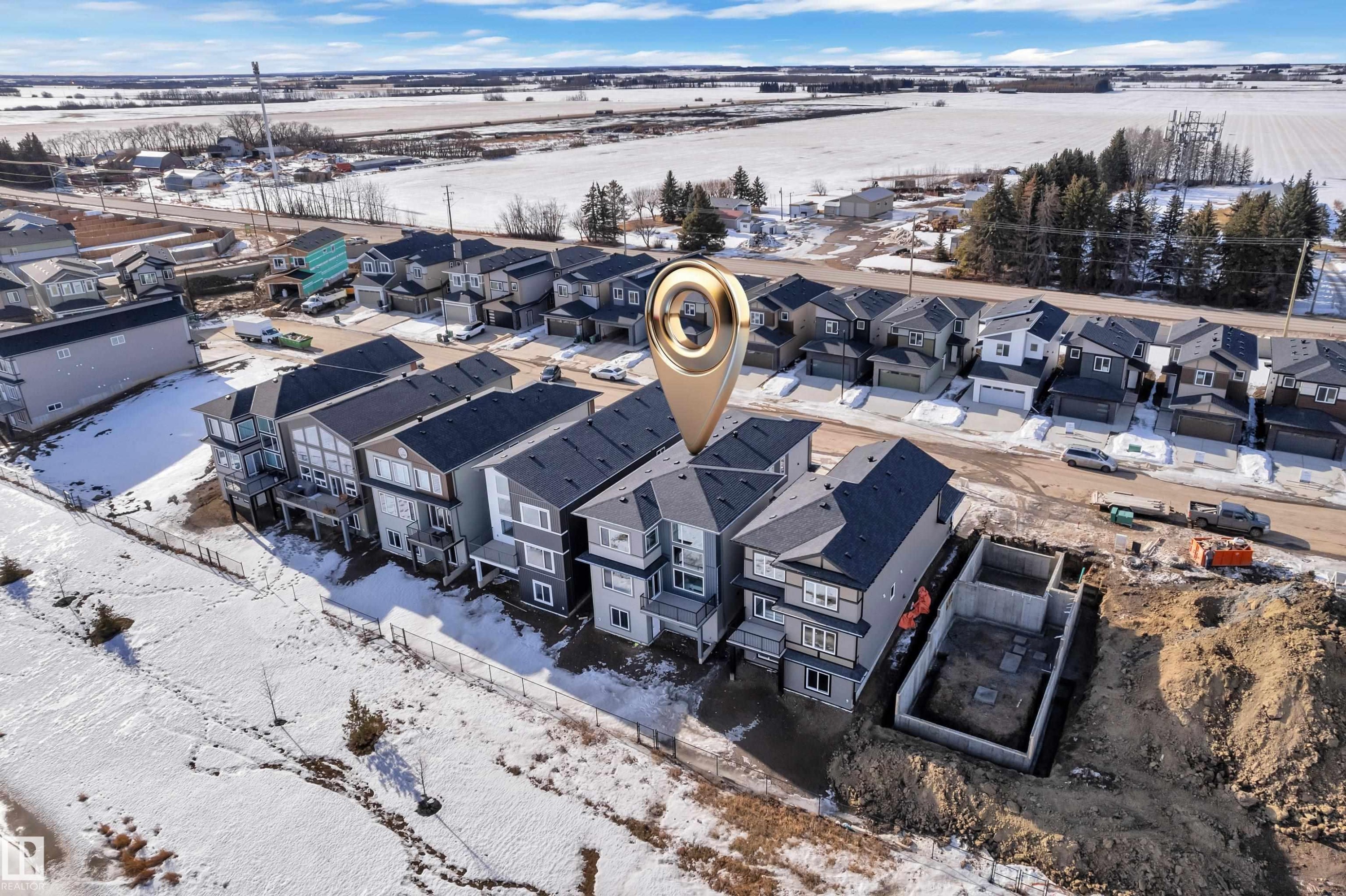 View of snowy aerial view - 228 Linden Loop, Leduc, AB - Outdoor With View