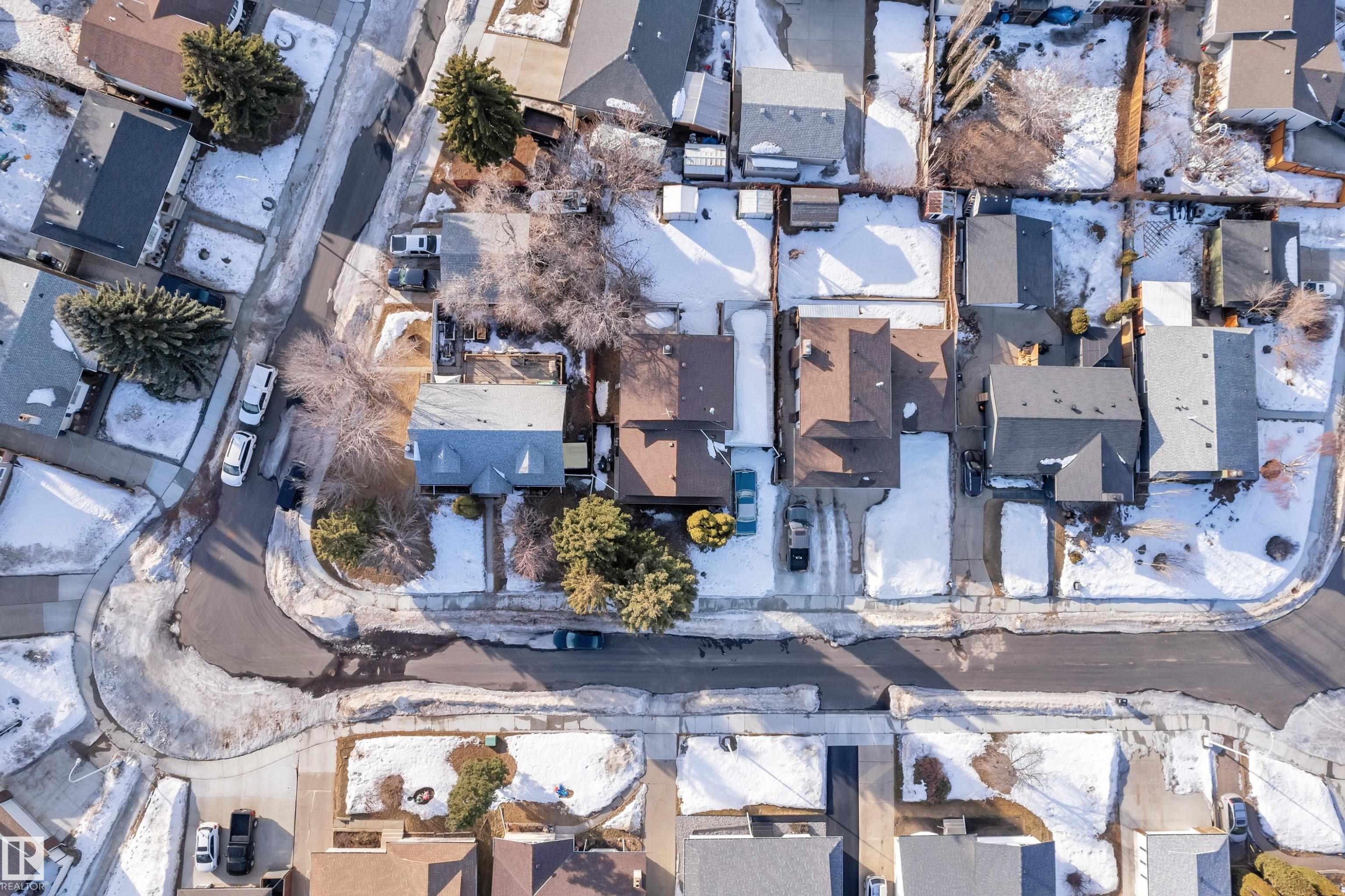 Aerial view of property and surrounding area featuring nearby suburban area - 135 Humberstone Road, Edmonton, AB - Outdoor With View