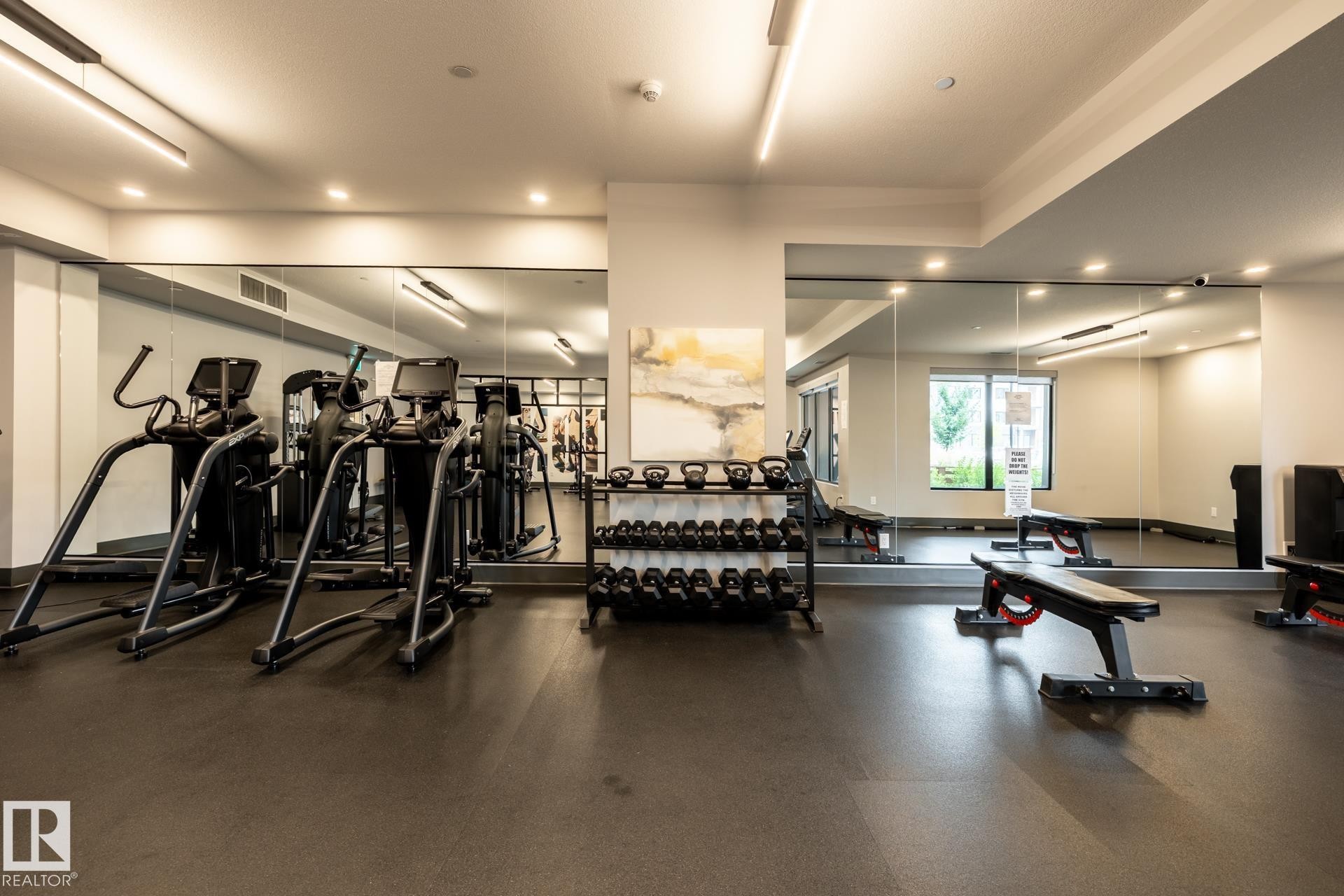Gym featuring recessed lighting - 112 7471 May Common, Edmonton, AB - Indoor Photo Showing Gym Room