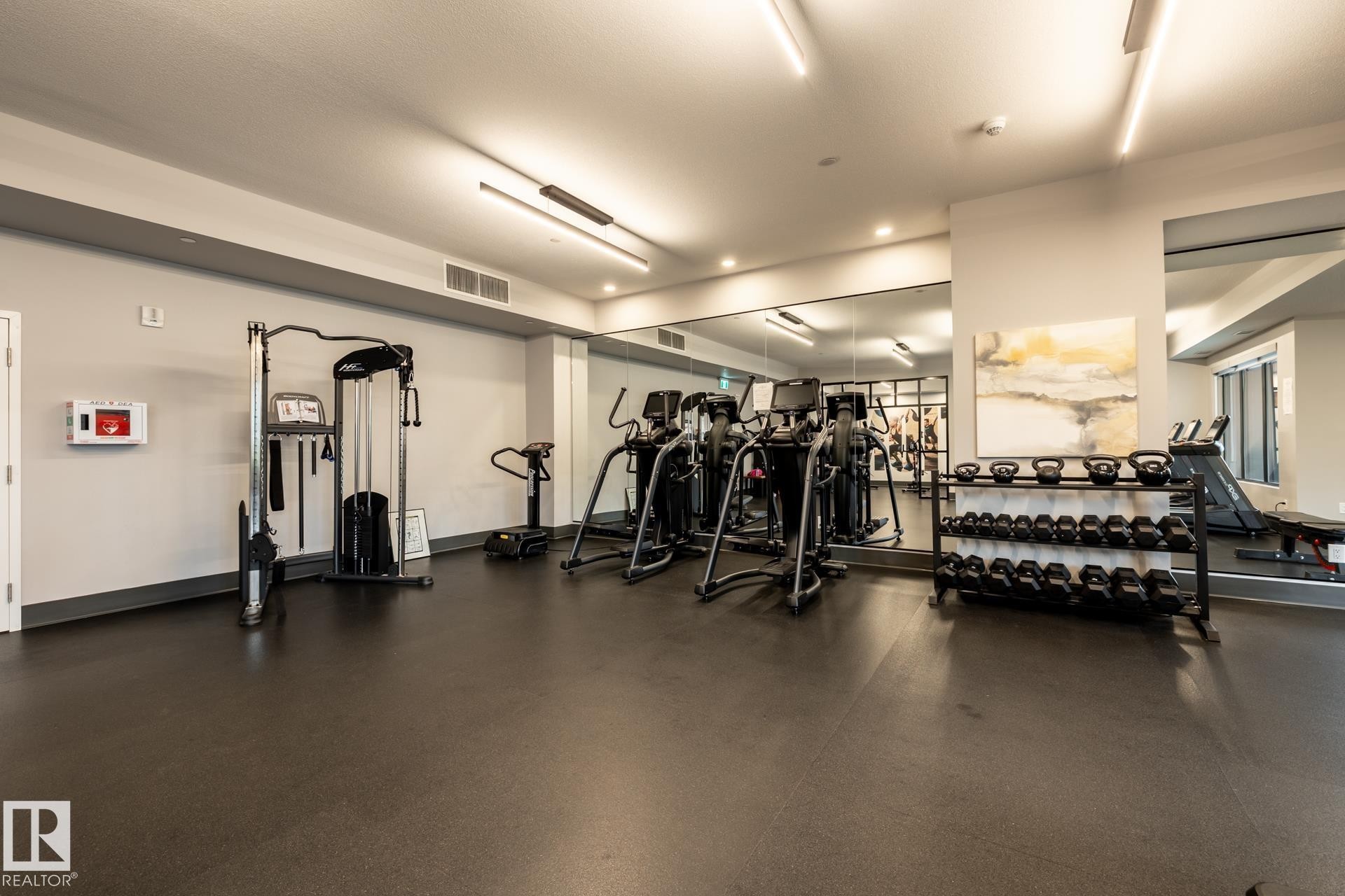Workout area featuring recessed lighting - 112 7471 May Common, Edmonton, AB - Indoor Photo Showing Gym Room