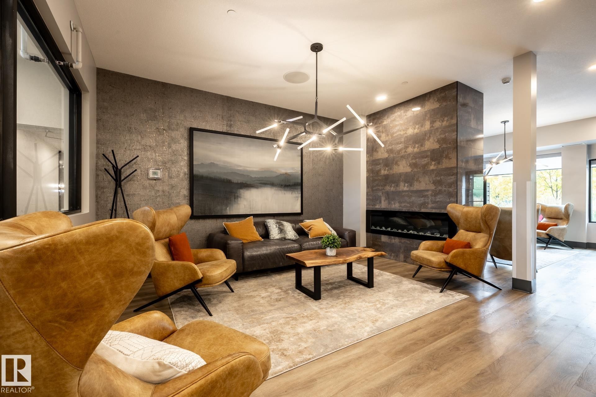 Community lobby with recessed lighting - 112 7471 May Common, Edmonton, AB - Indoor With Fireplace