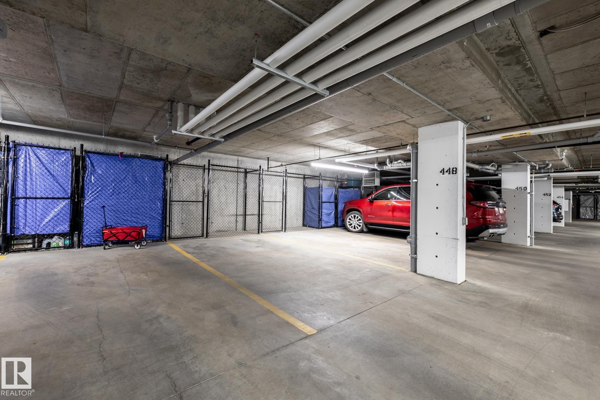 View of parking deck - 112 7471 May Common, Edmonton, AB - Indoor Photo Showing Garage