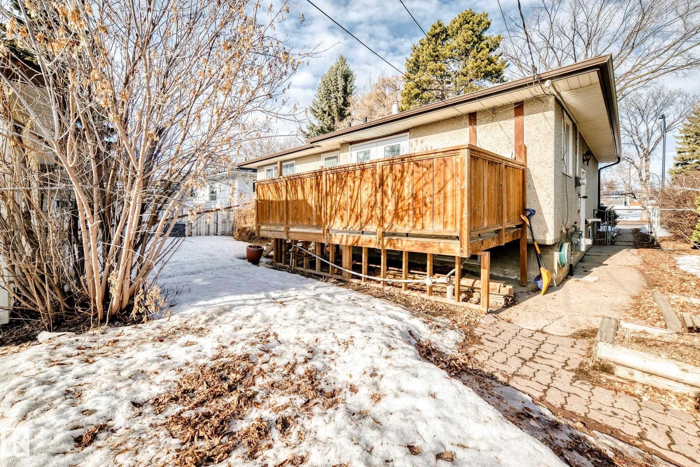 Rear view of house with a deck - 8639 64 Avenue Nw, Edmonton, AB - Outdoor With Deck Patio Veranda