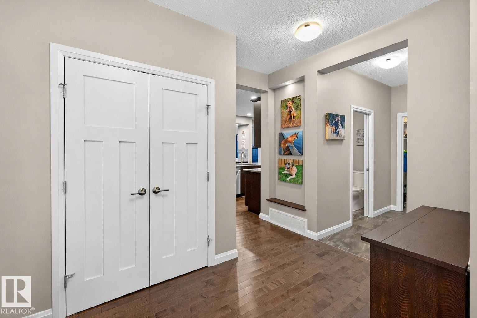 The property features hardwood floors, white interior doors, and neutral-toned walls - 17838 60A Street, Edmonton, AB - Indoor Photo Showing Other Room