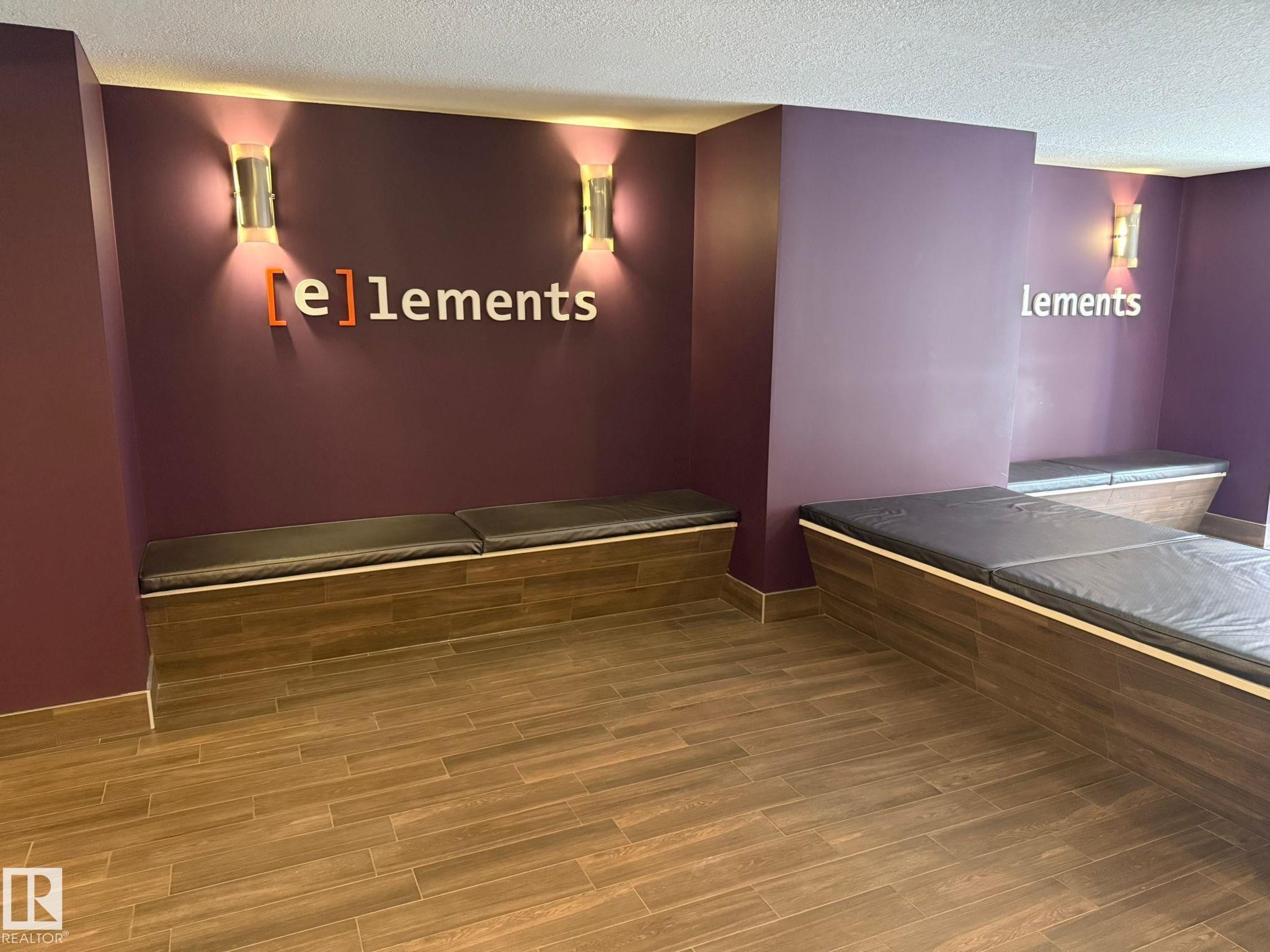Interior space featuring a textured ceiling - 211 340 Windermere Road, Edmonton, AB - Indoor Photo Showing Other Room