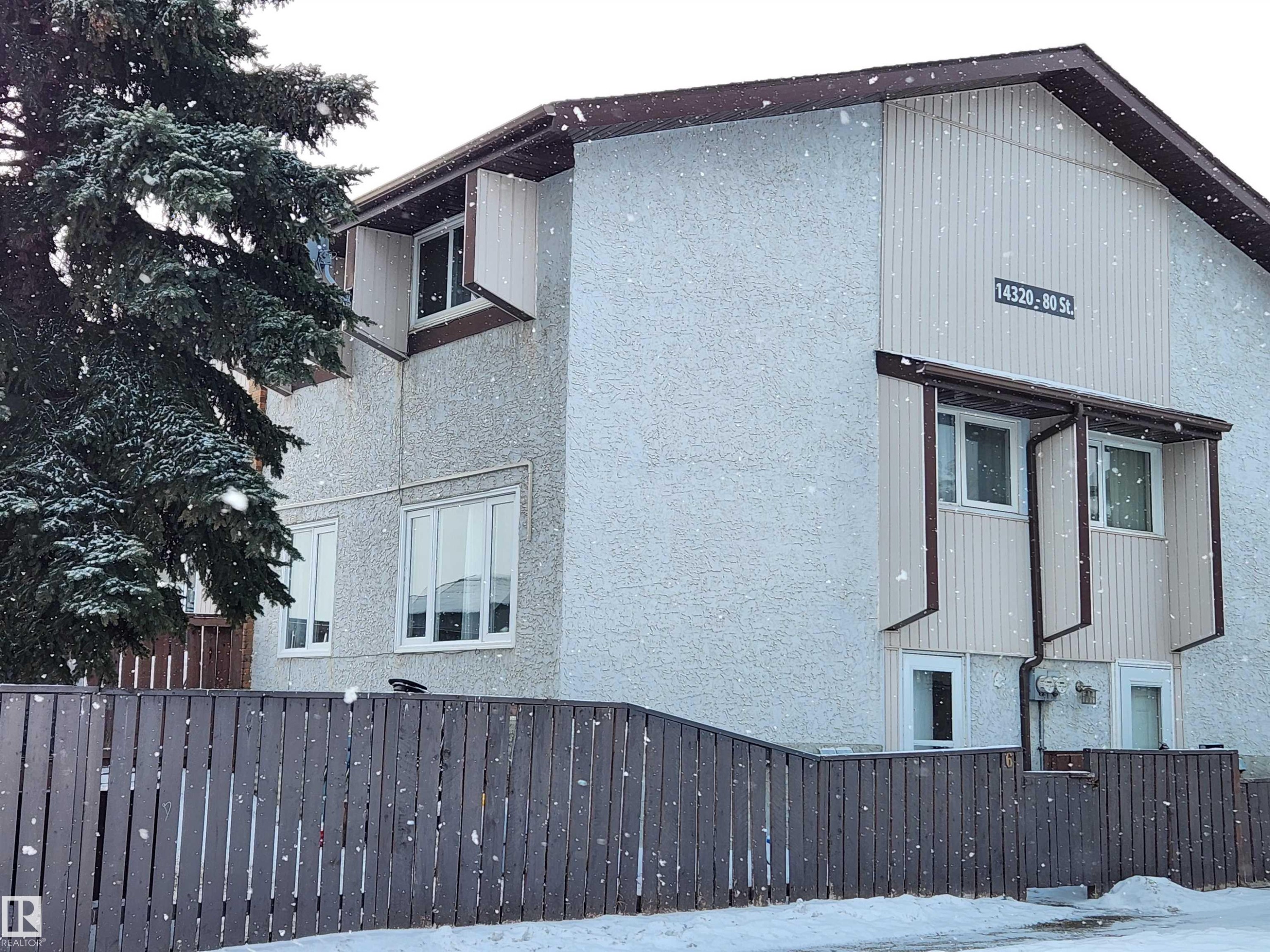 View of home's exterior with stucco siding - 6 14320 80 Street, Edmonton, AB - Outdoor With Exterior
