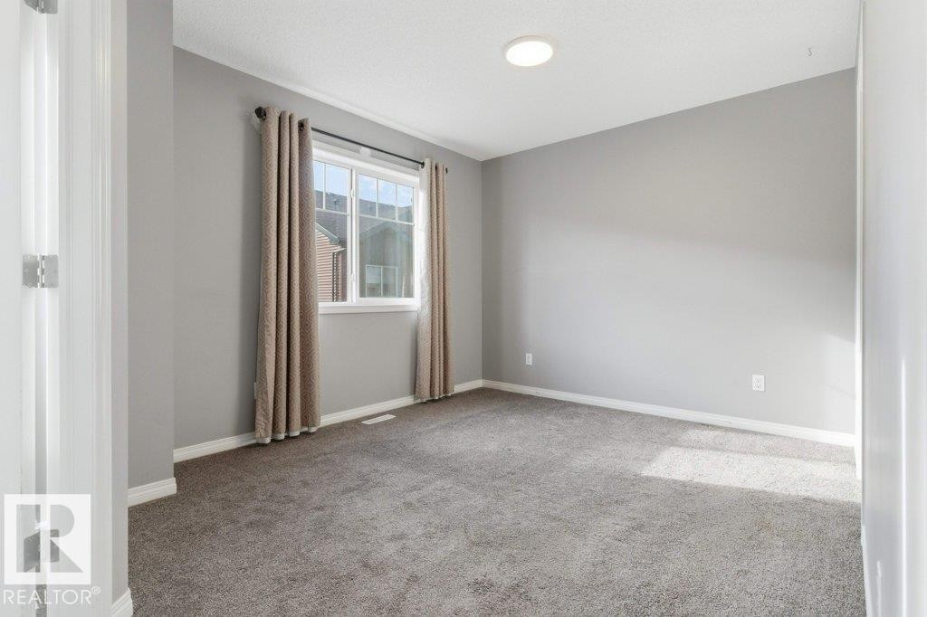 74 3305 Orchards Li, Edmonton, AB - Indoor Photo Showing Other Room