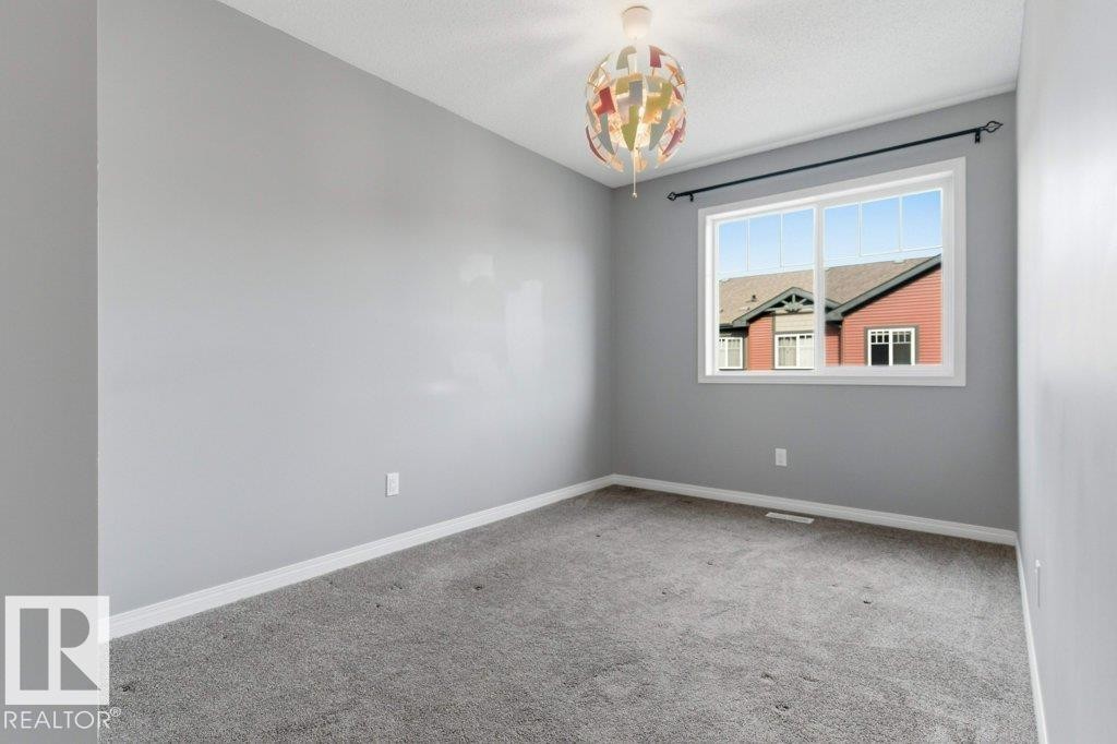 74 3305 Orchards Li, Edmonton, AB - Indoor Photo Showing Other Room