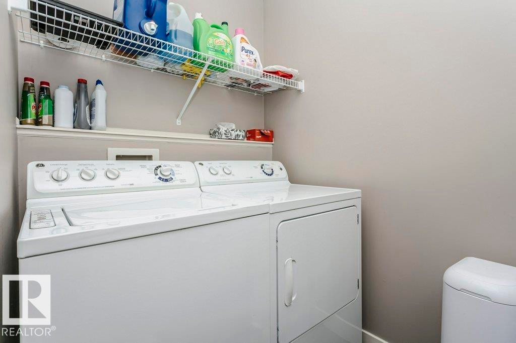 Laundry room featuring washer and clothes dryer - 1381 Rutherford Road, Edmonton, AB - Indoor Photo Showing Laundry Room