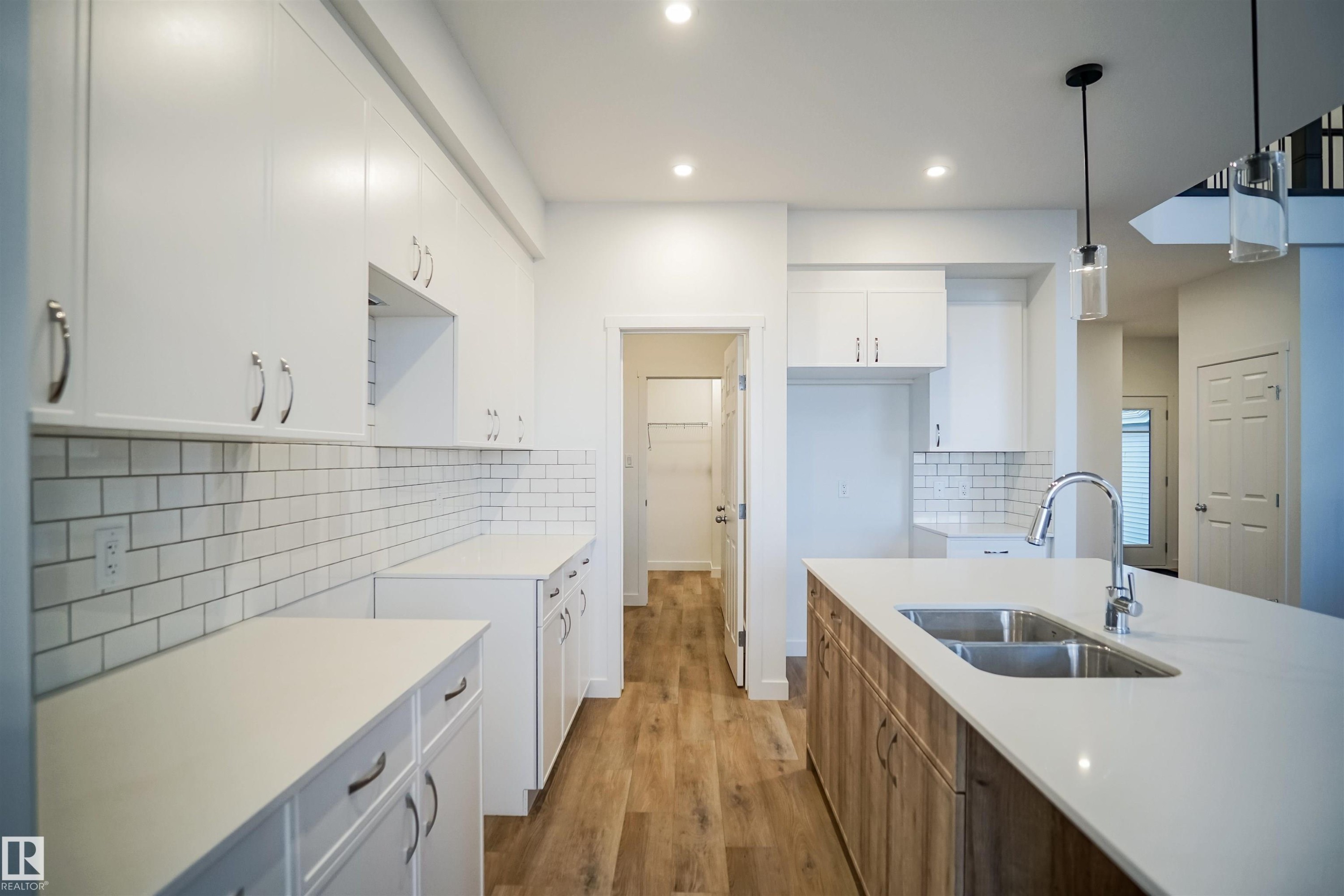 4645 Kinsella Landing, Edmonton, AB - Indoor Photo Showing Kitchen With Double Sink With Upgraded Kitchen