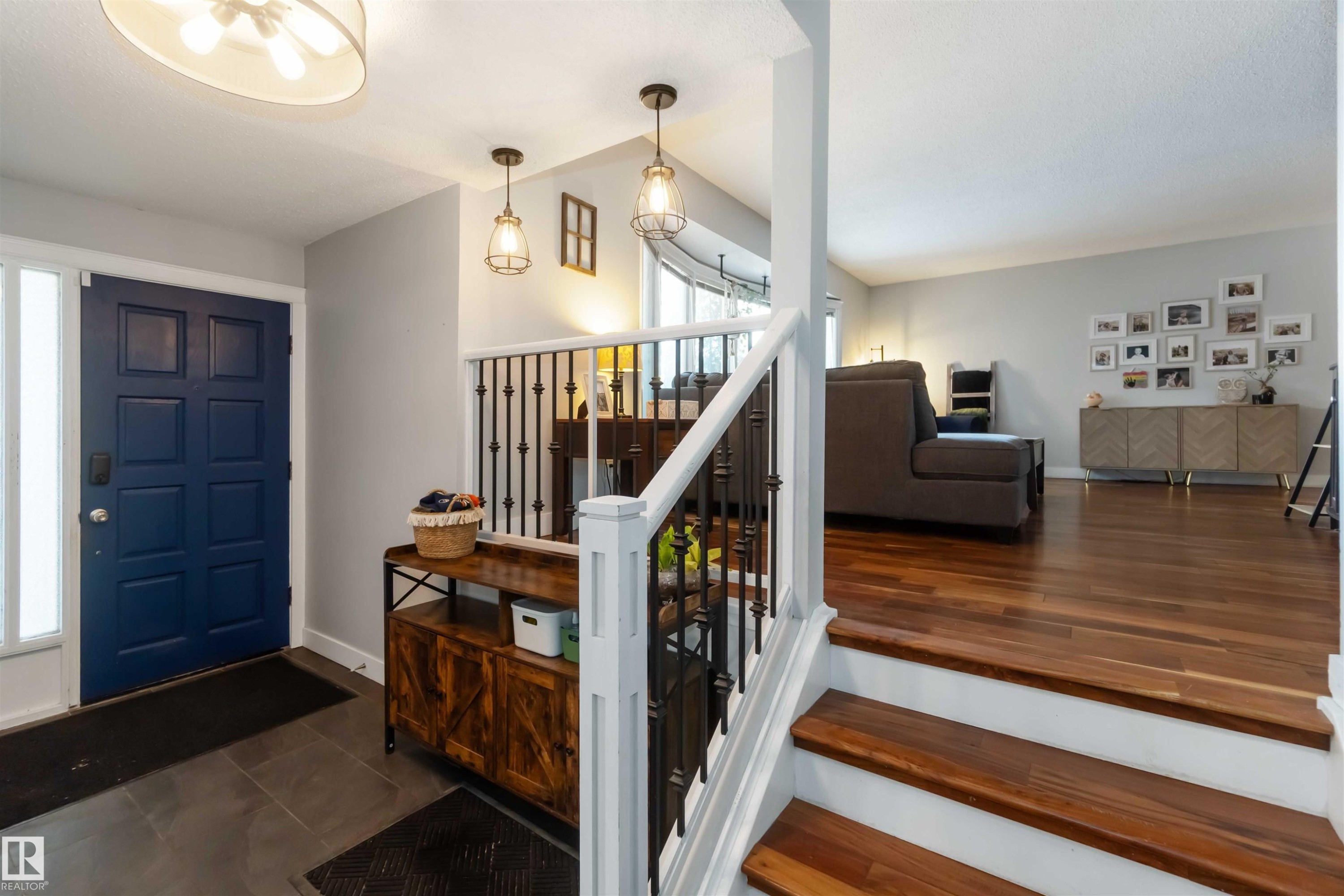Foyer entrance with baseboards and stairway - 6 Garraway Pl, St. Albert, AB - Indoor Photo Showing Other Room
