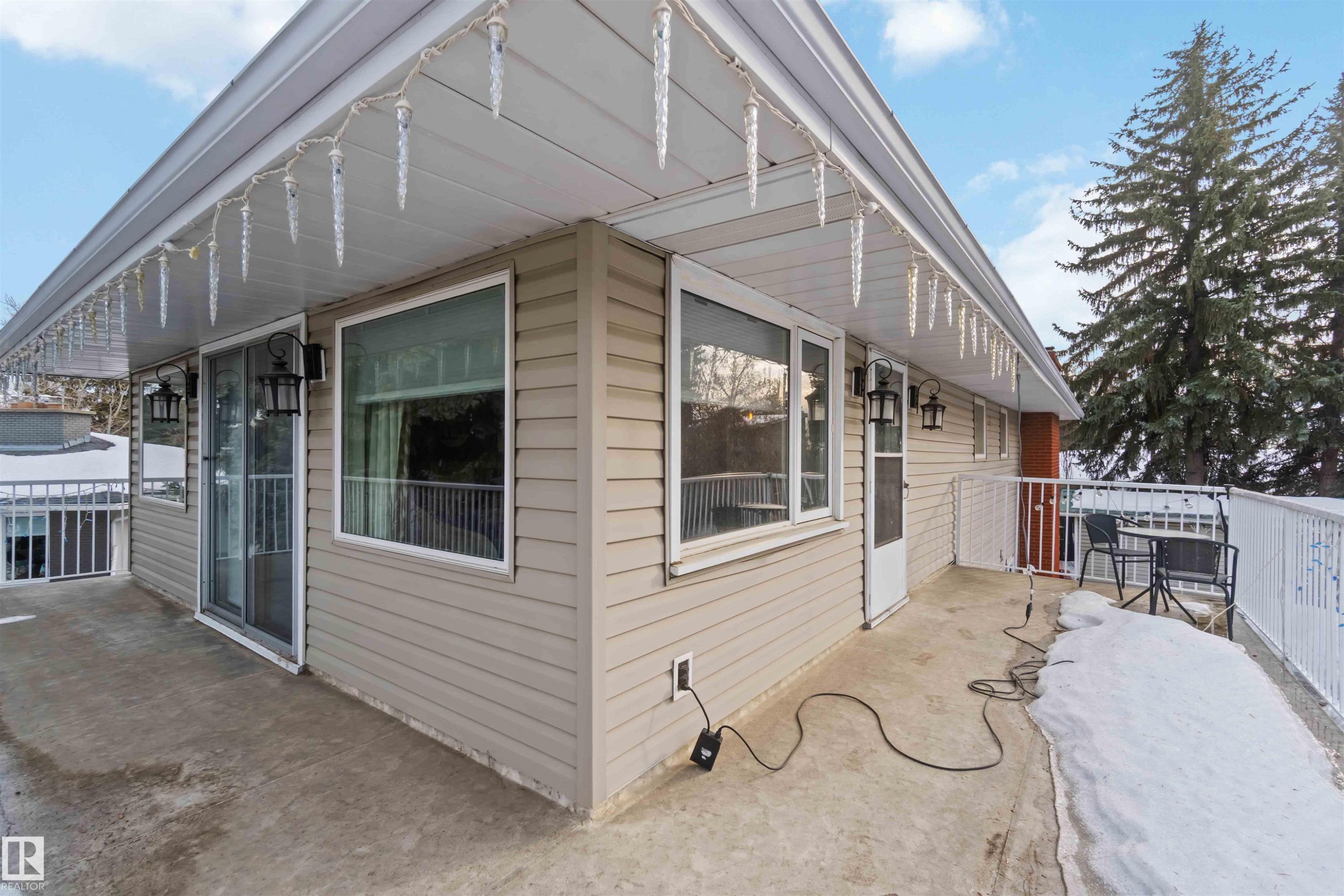 View of property exterior with a patio - 6 Garraway Pl, St. Albert, AB - Outdoor With Deck Patio Veranda