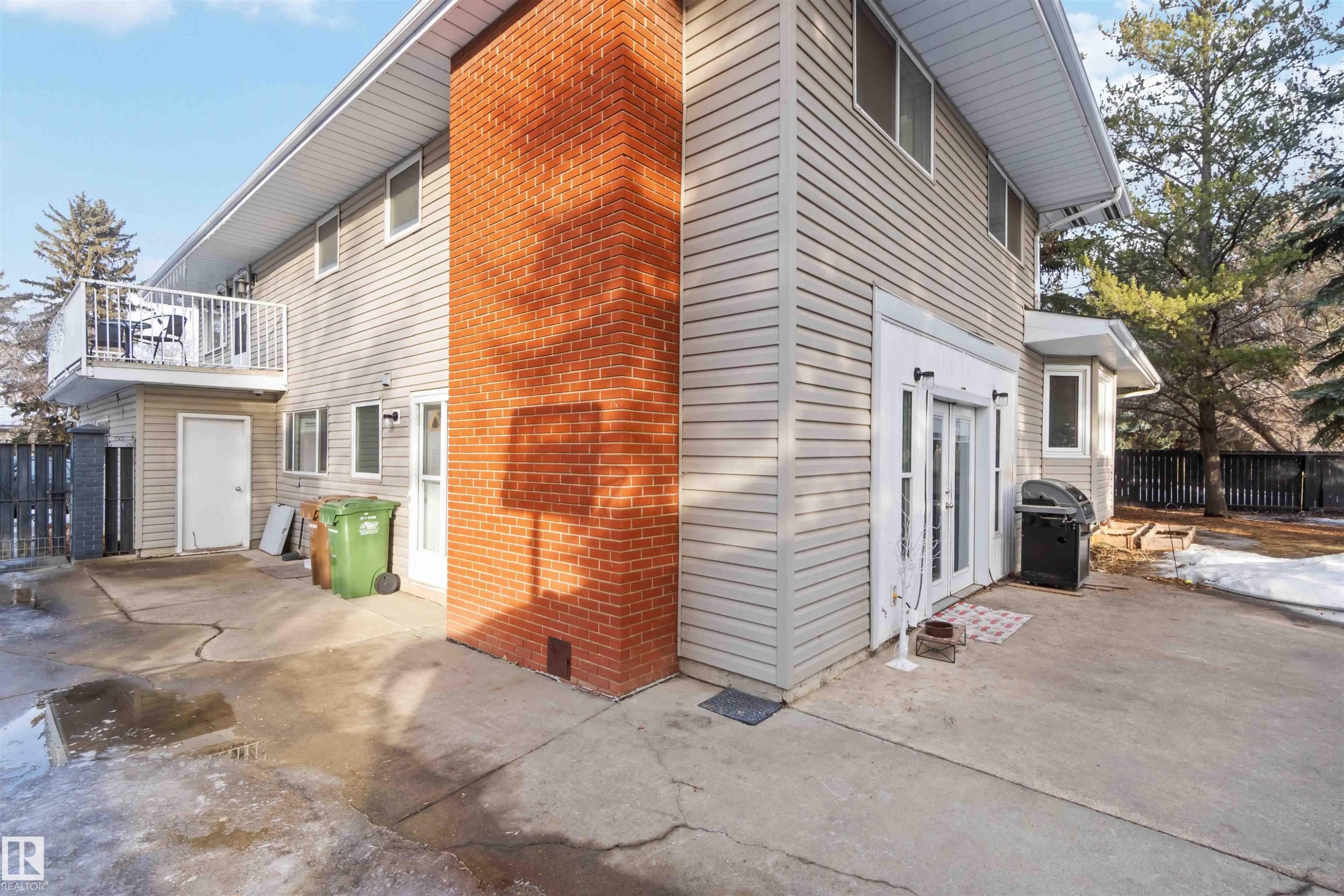 View of side of property with crawl space and a balcony - 6 Garraway Pl, St. Albert, AB - Outdoor