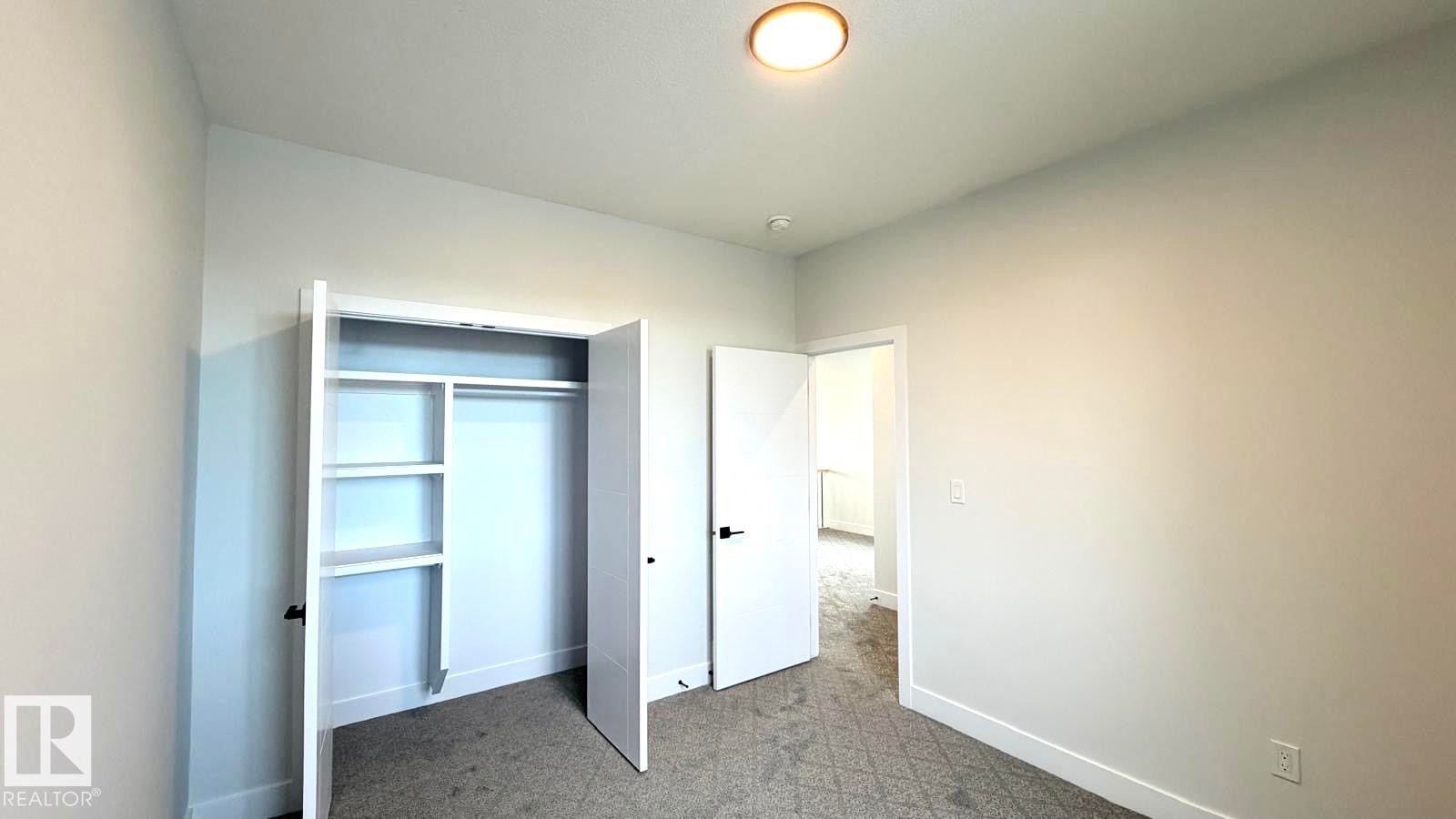 34 Astoria Place, Devon, AB - Indoor Photo Showing Other Room