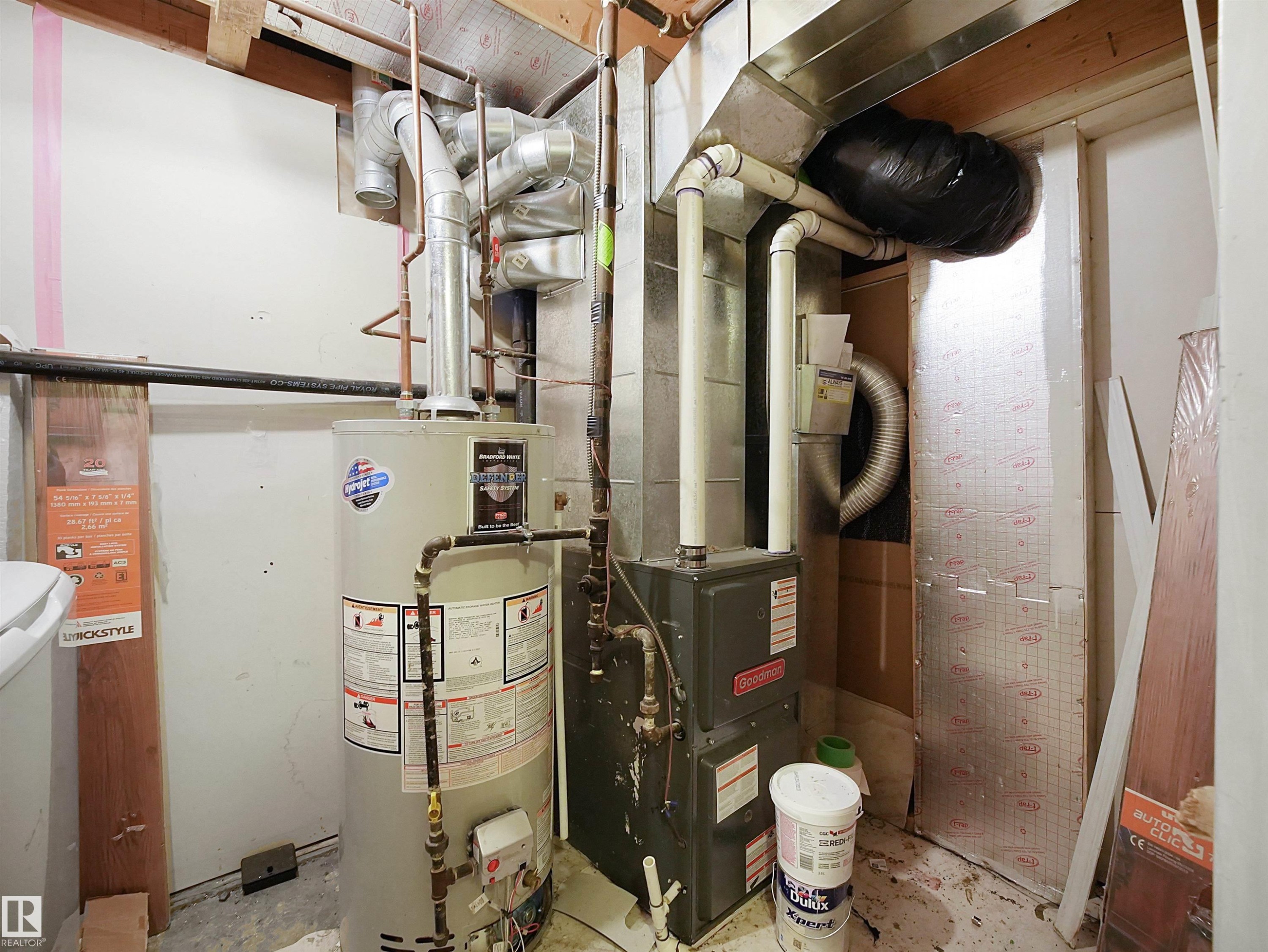 Utility room featuring gas water heater and heating unit - 791 Abbottsfield Road, Edmonton, AB - Indoor Photo Showing Basement
