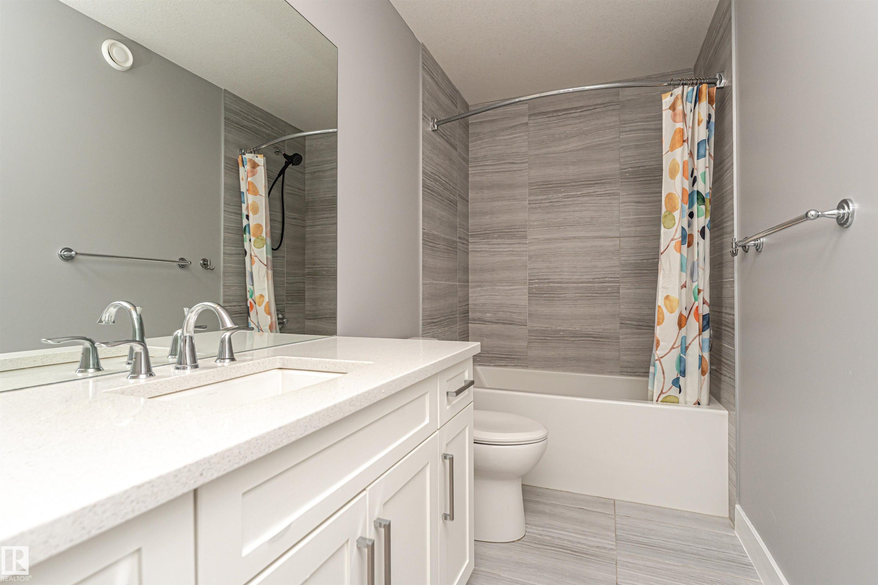 Full bath with vanity and shower / tub combo - 3611 Keswick Boulevard, Edmonton, AB - Indoor Photo Showing Bathroom