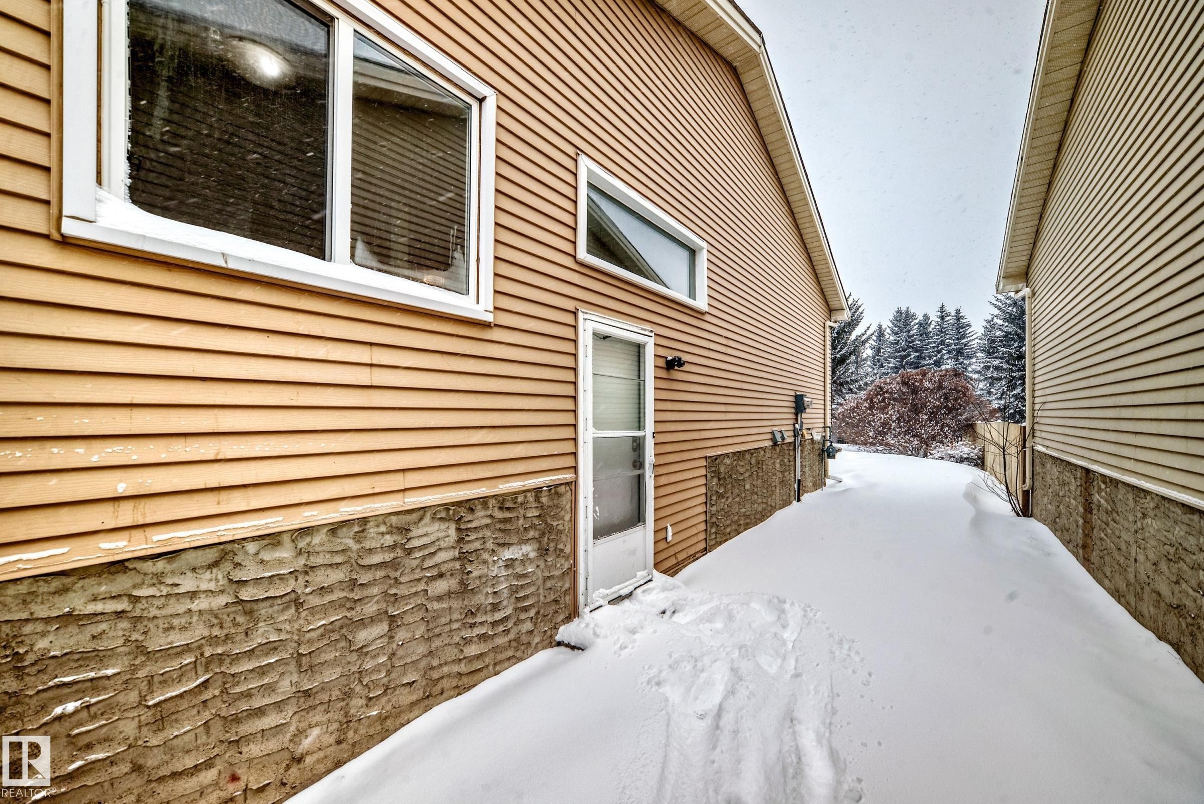 View of snow covered exterior - 5308 20 Avenue, Edmonton, AB - Outdoor With Exterior