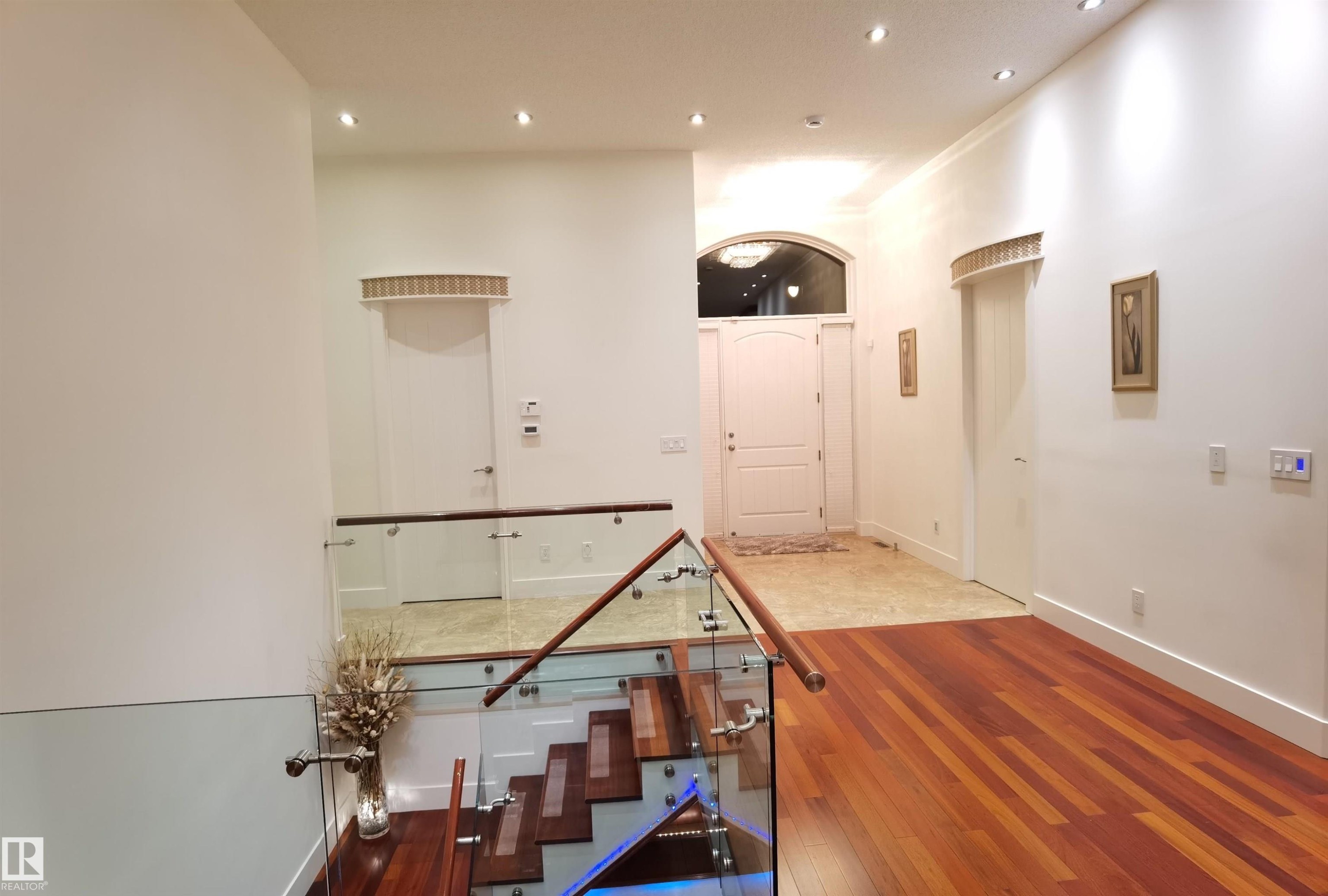 Staircase featuring hardwood / wood-style floors and recessed lighting - 169 Callaghan Drive, Edmonton, AB - Indoor Photo Showing Other Room