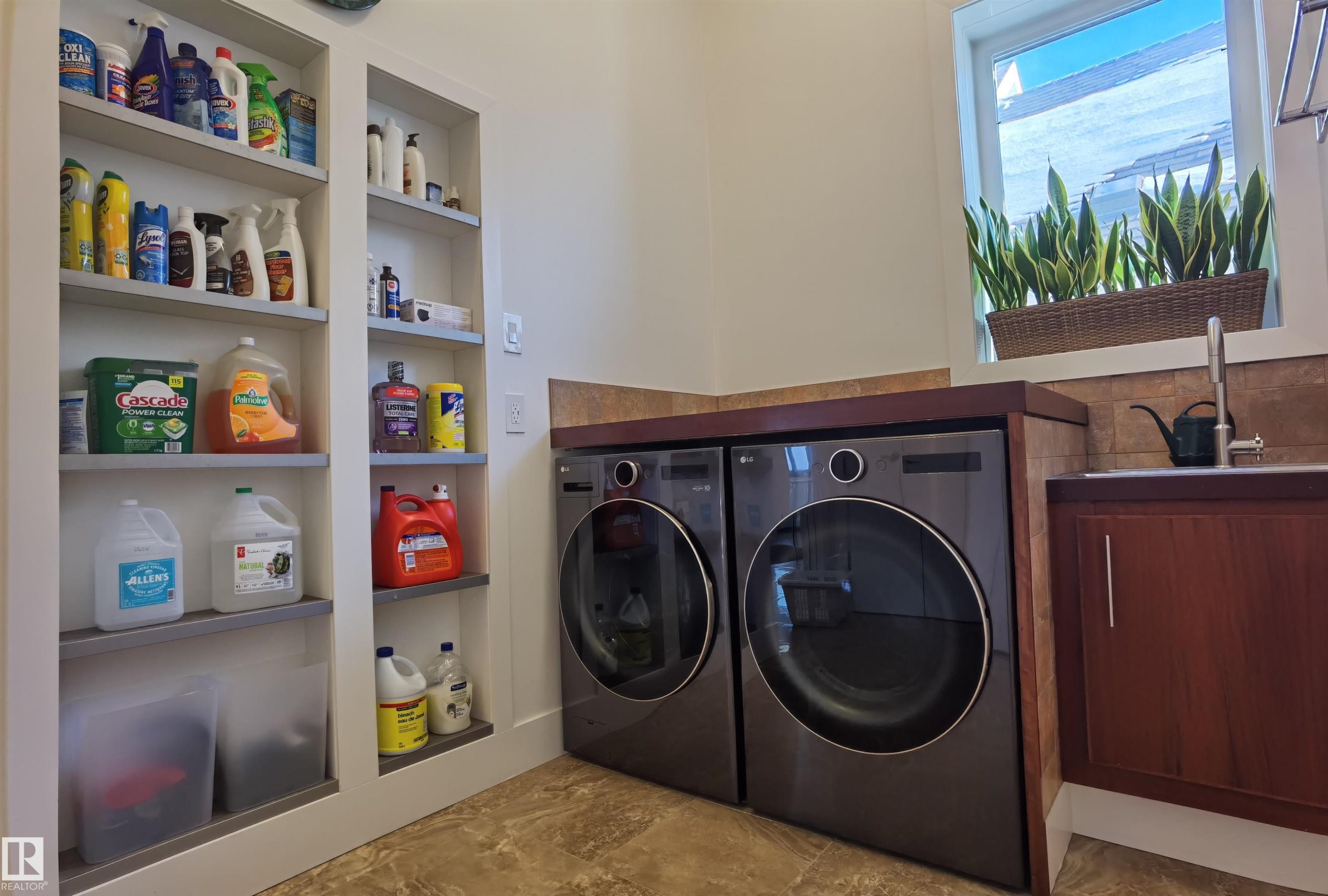 Spare room featuring recessed lighting, wood finished floors, a glass covered fireplace, and a high ceiling - 169 Callaghan Drive, Edmonton, AB - Indoor Photo Showing Other Room