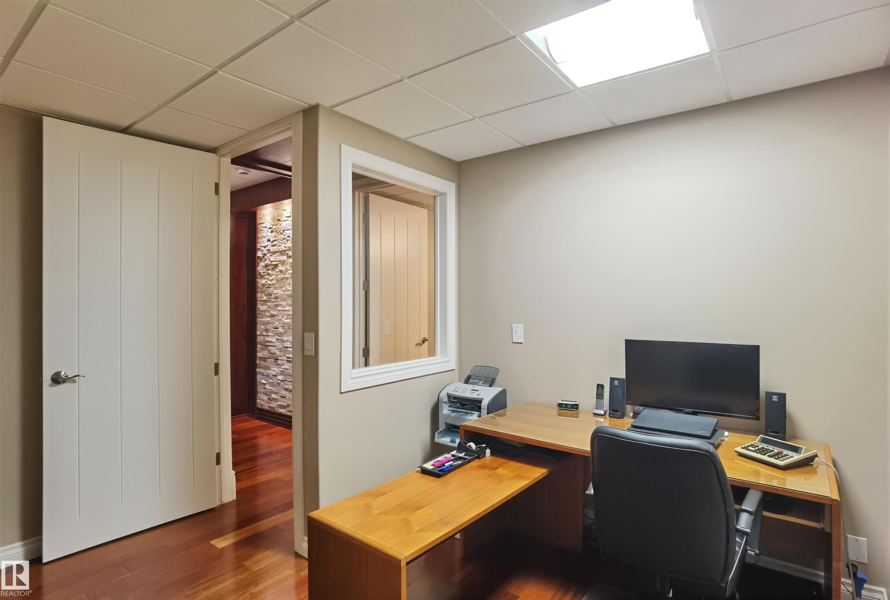 Home office featuring a paneled ceiling and dark wood-style floors - 169 Callaghan Drive, Edmonton, AB - Indoor Photo Showing Office