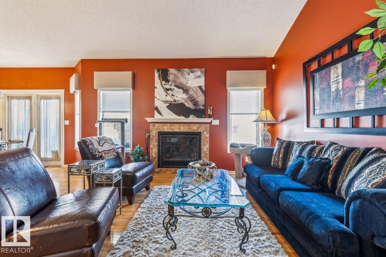 38 3003 34 Avenue, Edmonton, AB - Indoor Photo Showing Living Room With Fireplace