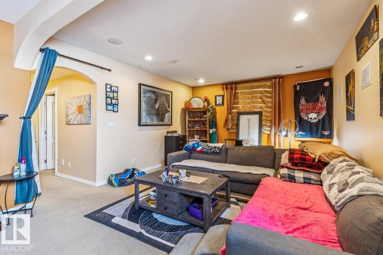Living room in basement - 38 3003 34 Avenue, Edmonton, AB - Indoor Photo Showing Living Room