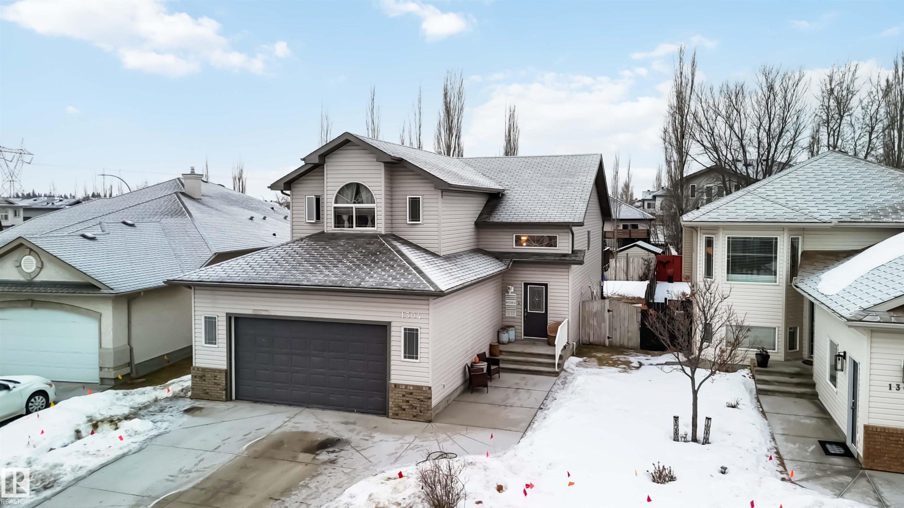 1304 Oakland Crescent, Devon, AB - Outdoor With Facade