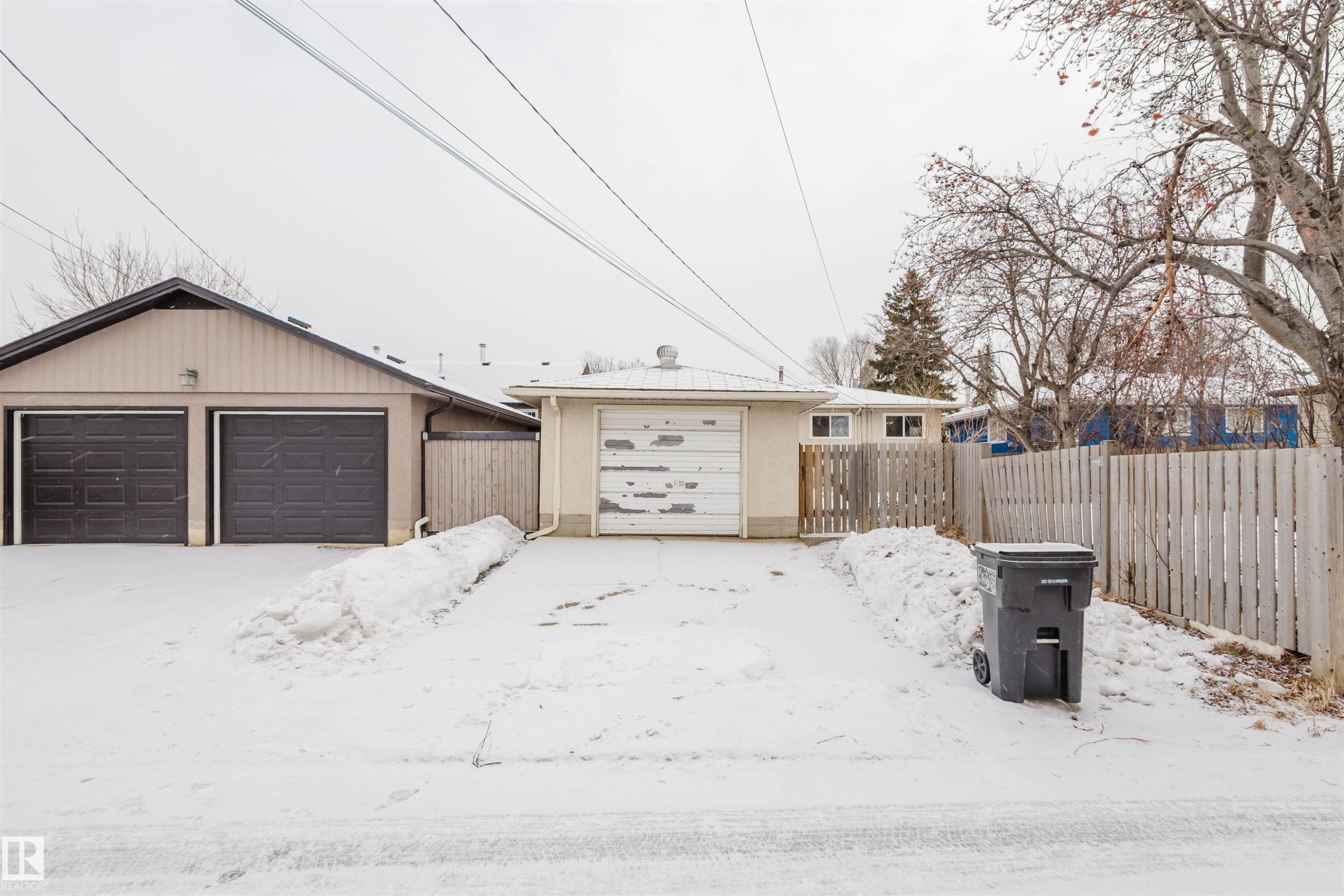 View of front of home with an outbuilding and a garage - 6048 105B Street Nw, Edmonton, AB - Outdoor