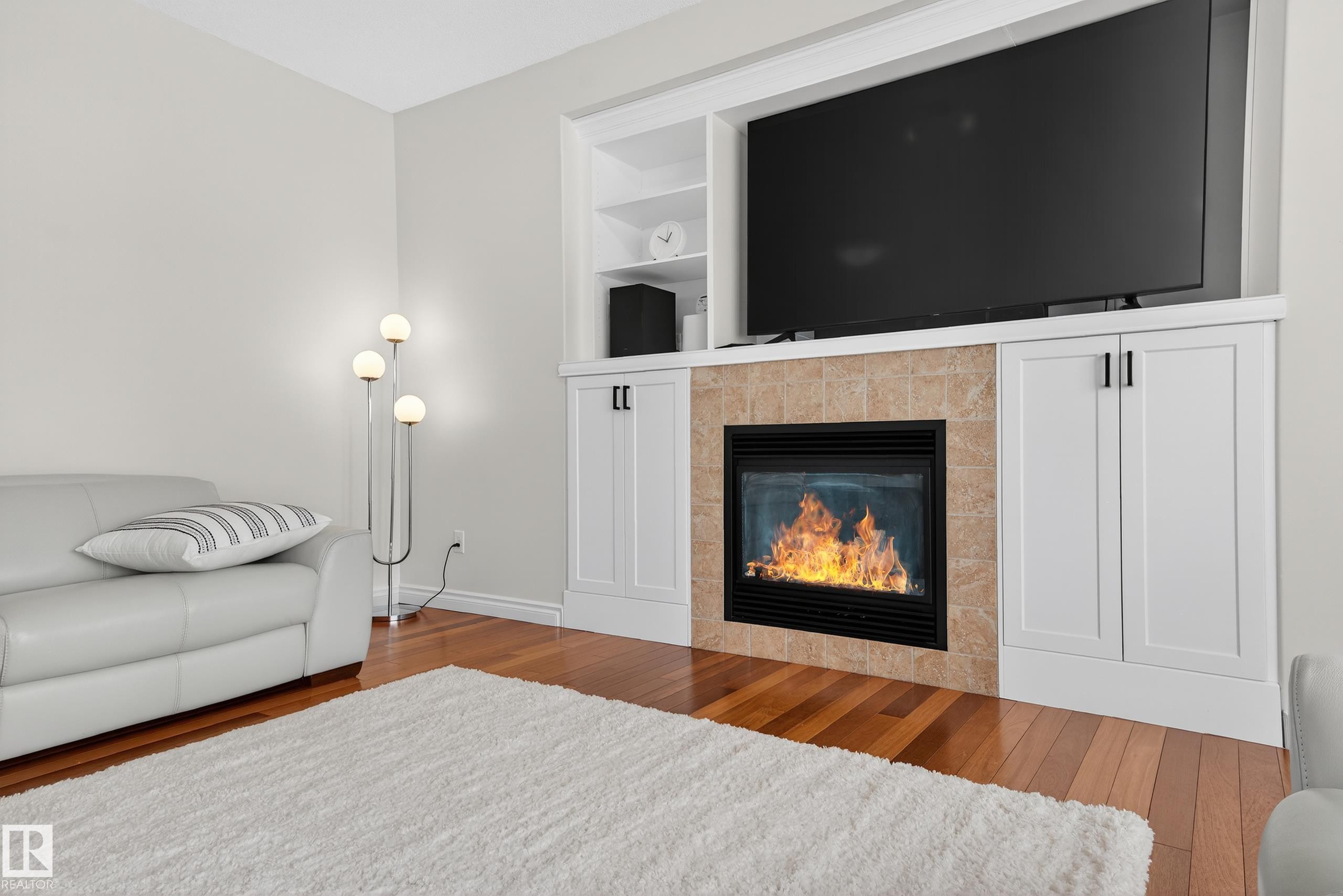 7507 Speaker Way, Edmonton, AB - Indoor Photo Showing Living Room With Fireplace