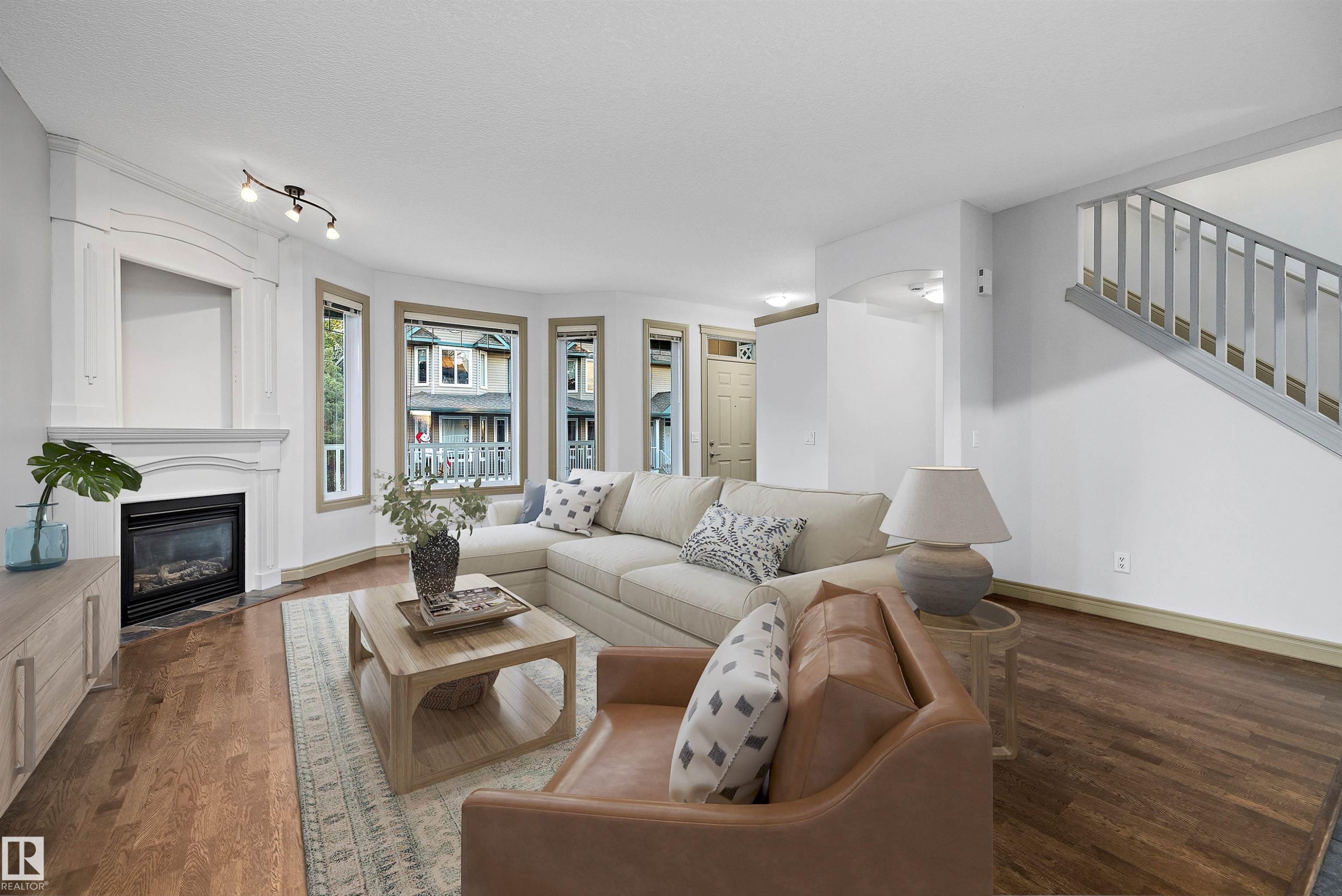 17 903 Rutherford Road, Edmonton, AB - Indoor Photo Showing Living Room With Fireplace